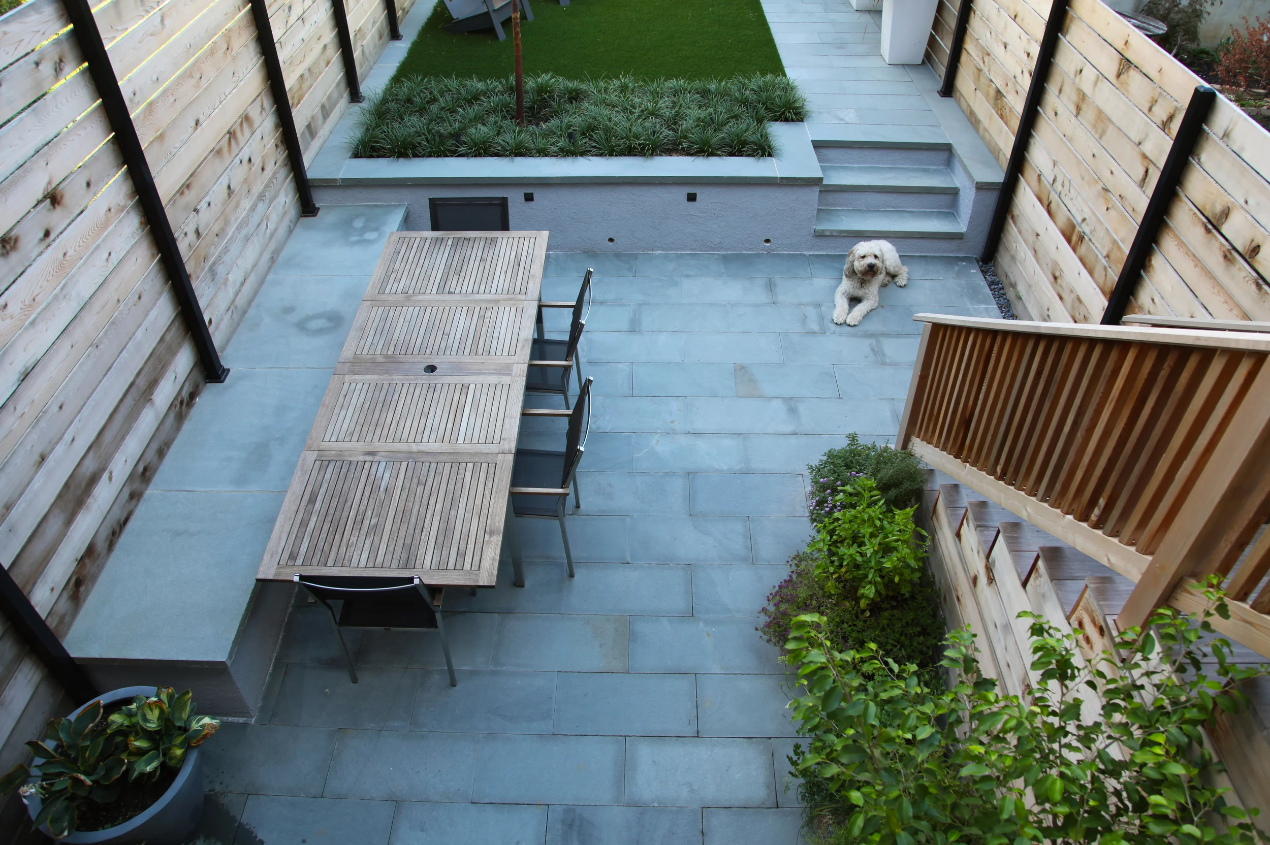 Project Location: Washington, DC (Columbia Heights) Completion: Spring 2015 General Contractor: Redux Garden & Home Primary Material Palette: thermal finish select blue bluestone, cedar, stucco concrete, synthetic turf, ipe Photos By: Moody Landscape Architecture
