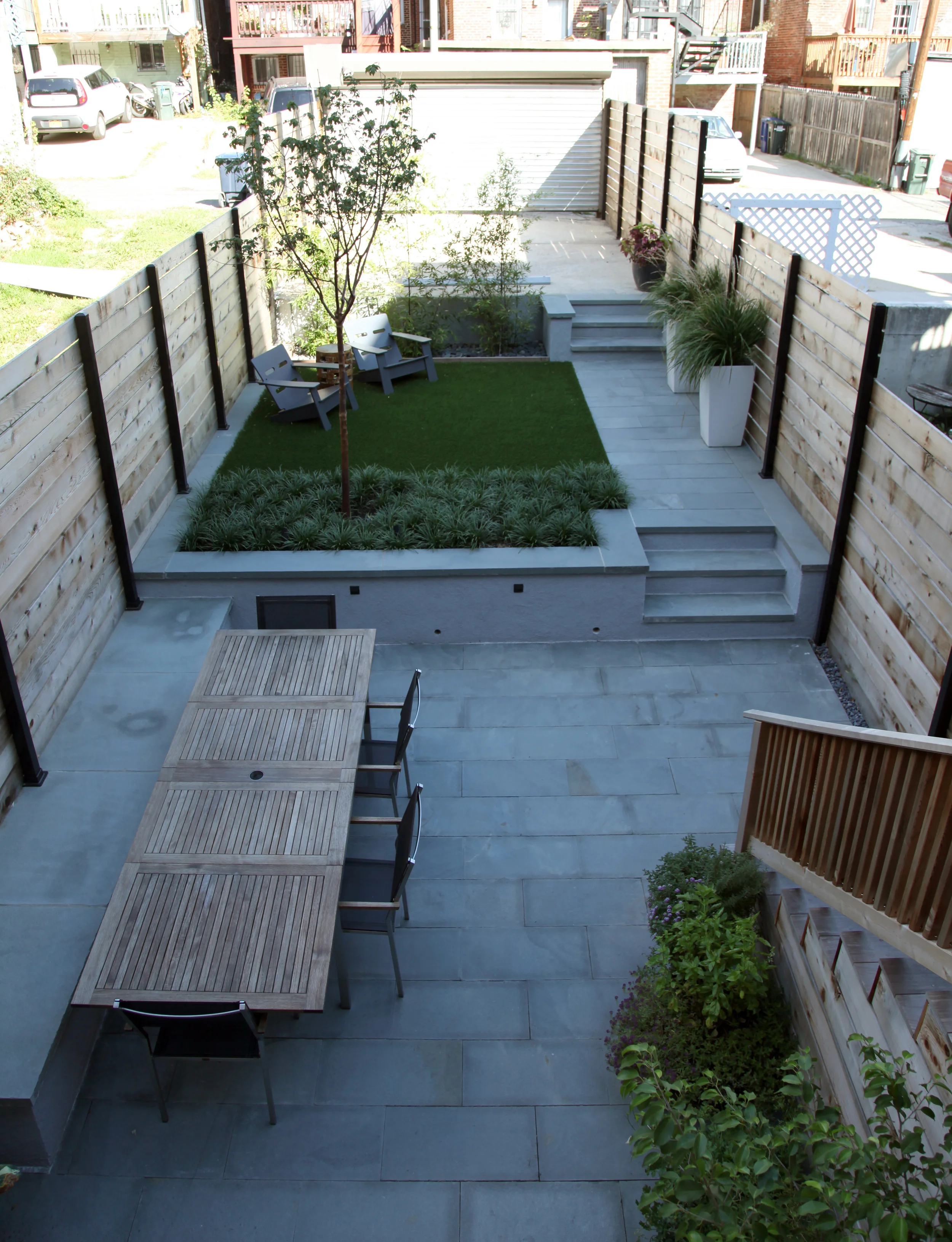 Project Location: Washington, DC (Columbia Heights) Completion: Spring 2015 General Contractor: Redux Garden & Home Primary Material Palette: thermal finish select blue bluestone, cedar, stucco concrete, synthetic turf, ipe Photos By: Moody Landscape Architecture