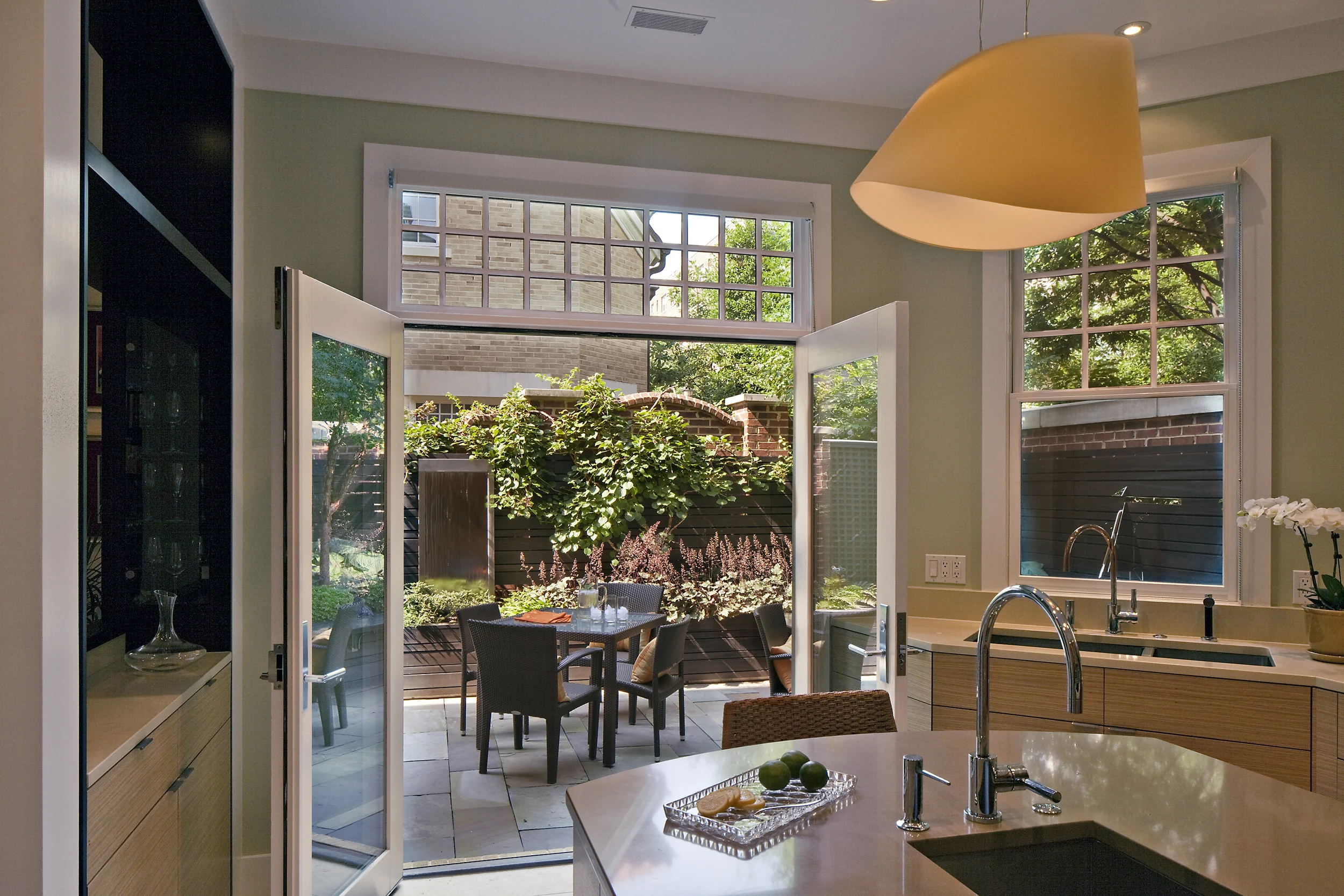 Project Location: Washington, DC (Cathedral Heights) Completion: 2010 General Contractor: Quarry Aquatics, Evergro Landscaping Primary Material Palette: bluestone, brick, European hornbeam Photos By: Allen Russ Awards: Honor Award, American Society of Landscape Architects Maryland Chapter, 2009