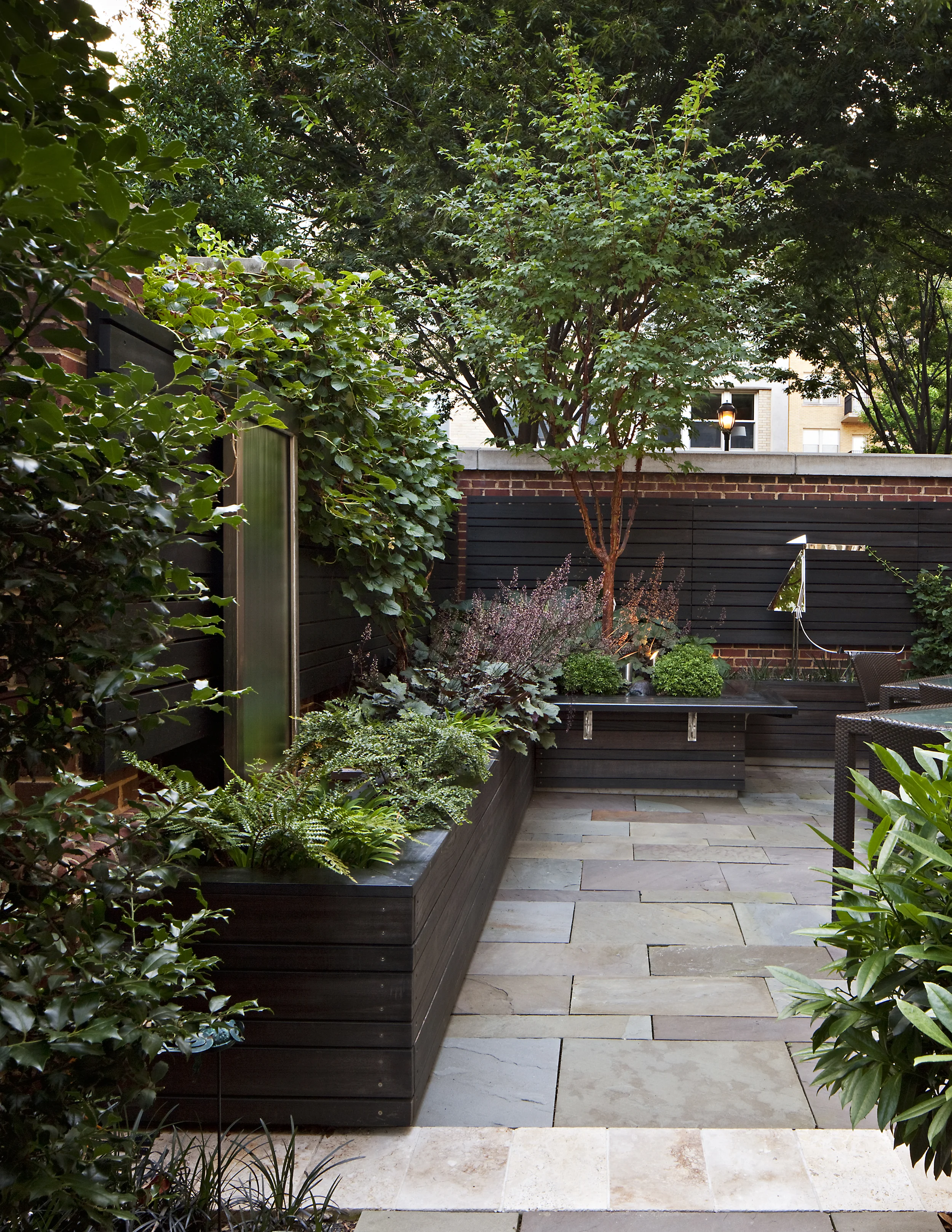 Project Location: Washington, DC (Cathedral Heights) Completion: 2010 General Contractor: Quarry Aquatics, Evergro Landscaping Primary Material Palette: bluestone, brick, European hornbeam Photos By: Allen Russ Awards: Honor Award, American Society of Landscape Architects Maryland Chapter, 2009