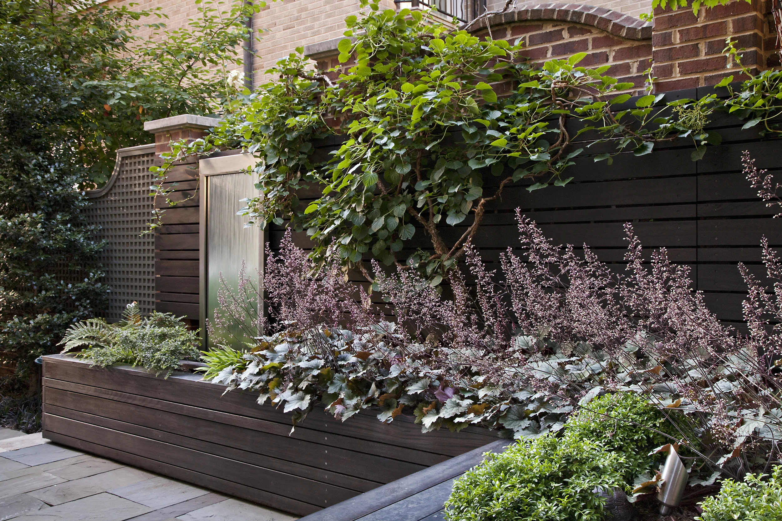 Project Location: Washington, DC (Cathedral Heights) Completion: 2010 General Contractor: Quarry Aquatics, Evergro Landscaping Primary Material Palette: bluestone, brick, European hornbeam Photos By: Allen Russ Awards: Honor Award, American Society of Landscape Architects Maryland Chapter, 2009