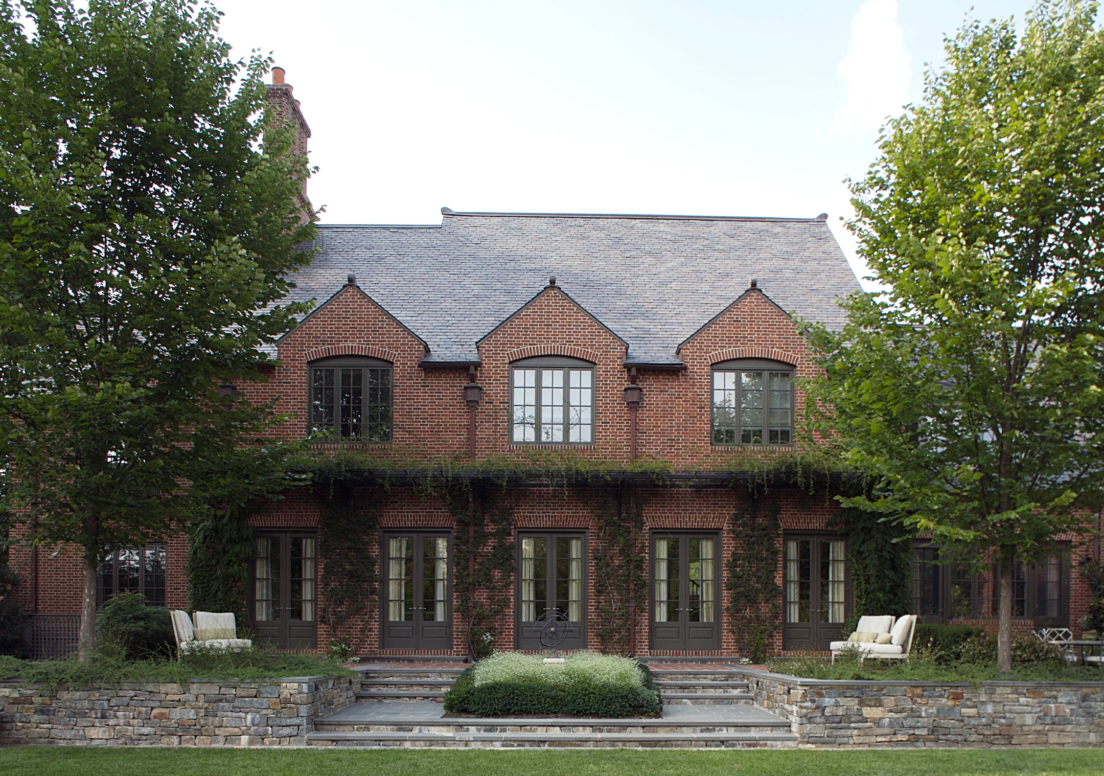 Project Location: Chevy Chase, Maryland Completion: 2006 General Contractor: Gibson & Associates Project Architect: Jones & Boer Primary Material Palette: brick, bluestone, fieldstone, boxwood Photos By: Victoria Cooper Awards: Merit Award, Builder’s Choice, 2005