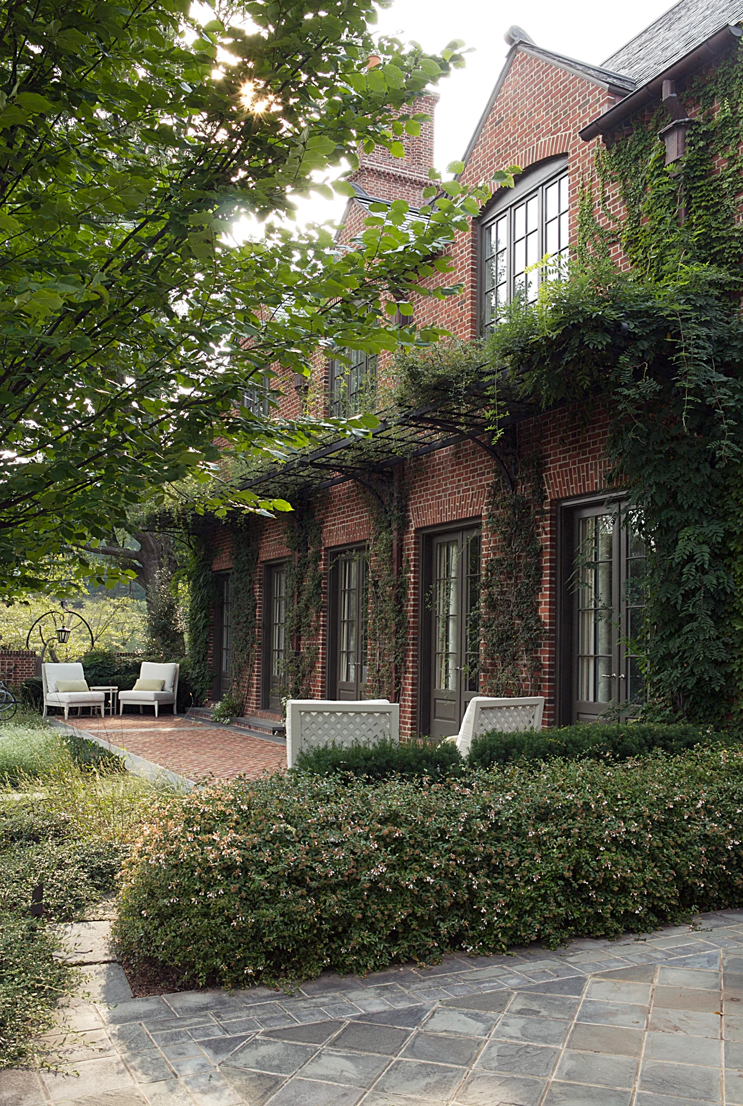 Project Location: Chevy Chase, Maryland Completion: 2006 General Contractor: Gibson & Associates Project Architect: Jones & Boer Primary Material Palette: brick, bluestone, fieldstone, boxwood Photos By: Victoria Cooper Awards: Merit Award, Builder’s Choice, 2005