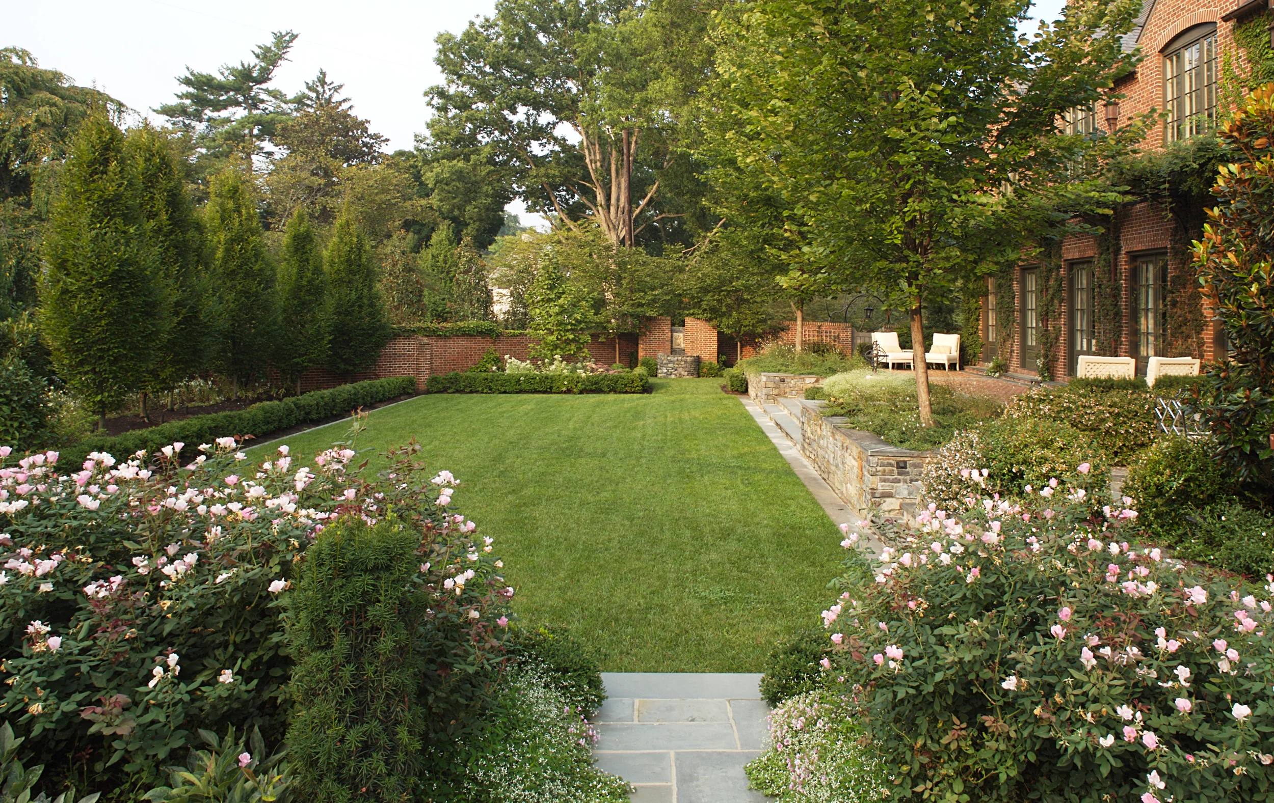 Project Location: Chevy Chase, Maryland Completion: 2006 General Contractor: Gibson & Associates Project Architect: Jones & Boer Primary Material Palette: brick, bluestone, fieldstone, boxwood Photos By: Victoria Cooper Awards: Merit Award, Builder’s Choice, 2005