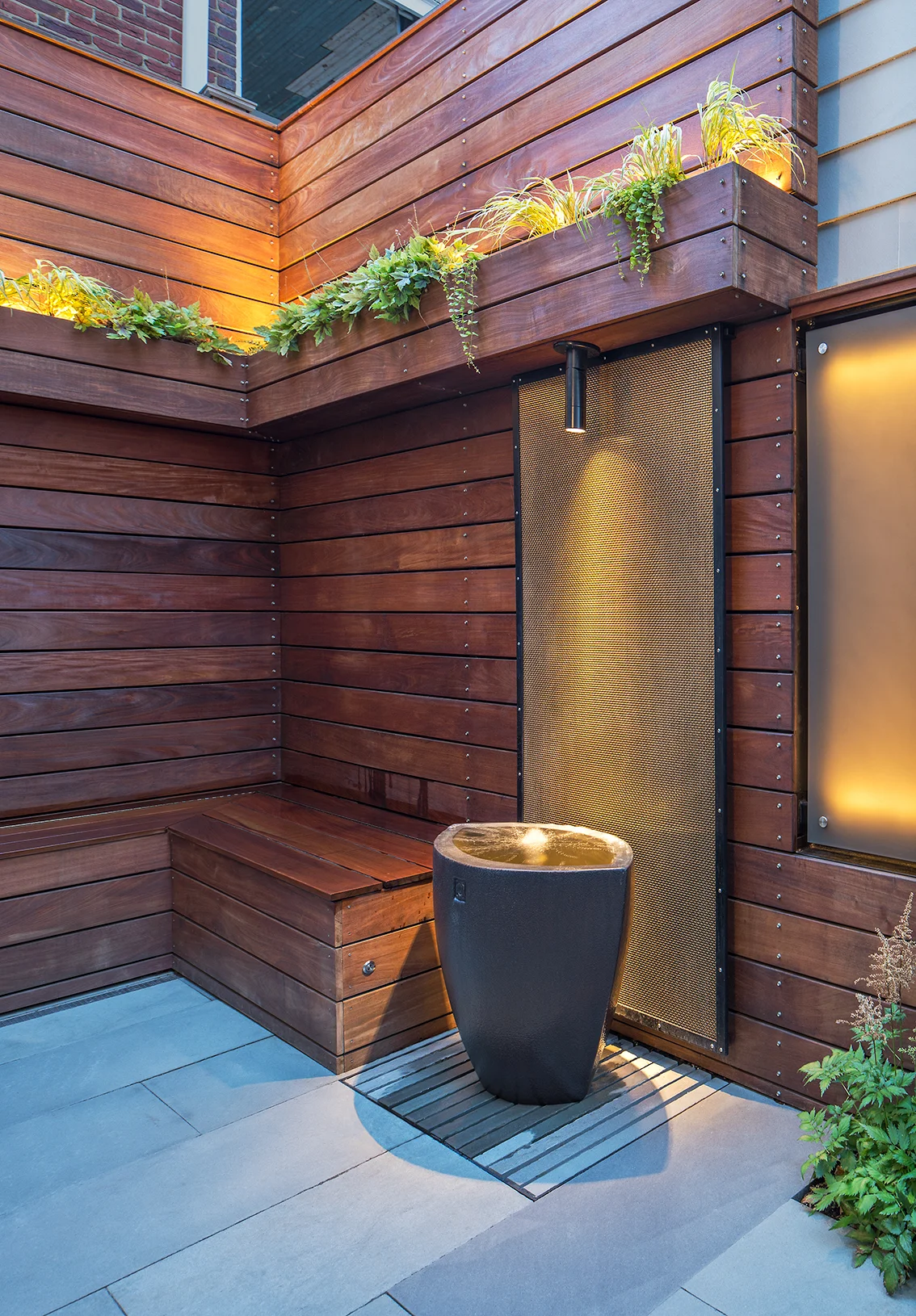 Project Location: Washington, DC (Capitol Hill) Project Type: Single Family Residential Completion: Spring 2017 General Contractor: Oldetowne Primary Material Palette: select blue bluestone, ipe, 3form polycarbonate panel, bronze mesh Photos By: Allen Russ