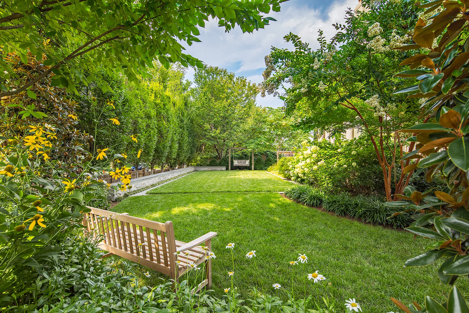 Project Location: Washington, DC (Chevy Chase) Completion: Fall 2013 General Contractor: Redux Garden & Home Project Architect: E/L Studio (garage design) Primary Material Palette: granite cobblestones, bluestone, Port Deposit granite, western red cedar, copper Photo By: Allen Russ