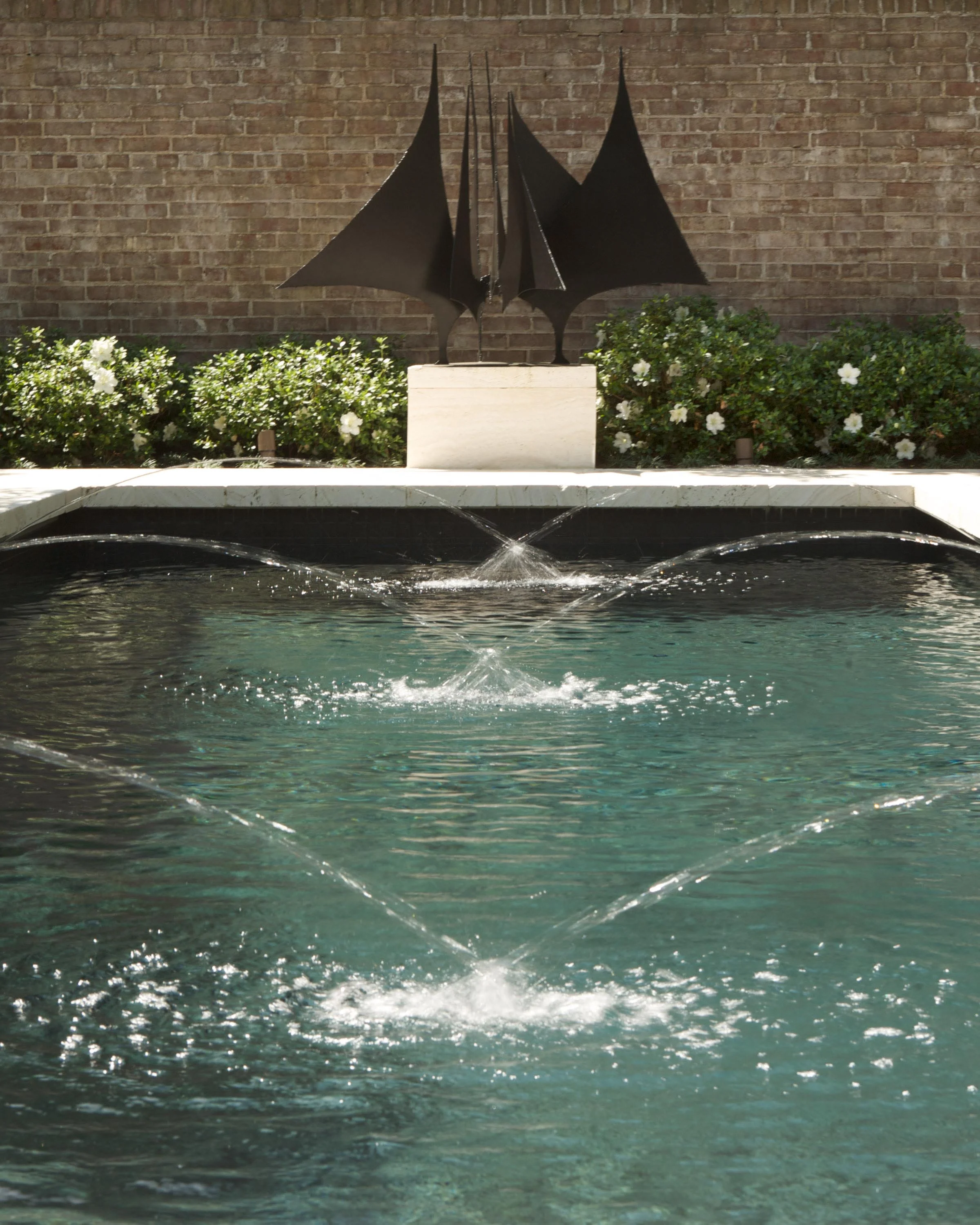 Project Location: Washington, DC Completion: 2008 General Contractor: Evergro Landscaping Primary Material Palette: Travertine, Crape Myrtle, Azalea Photos By: Victoria Cooper