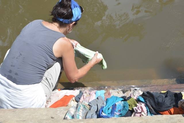 Doing laundry with the Achuar, in Ecuador photo by Kathryn Stieneker