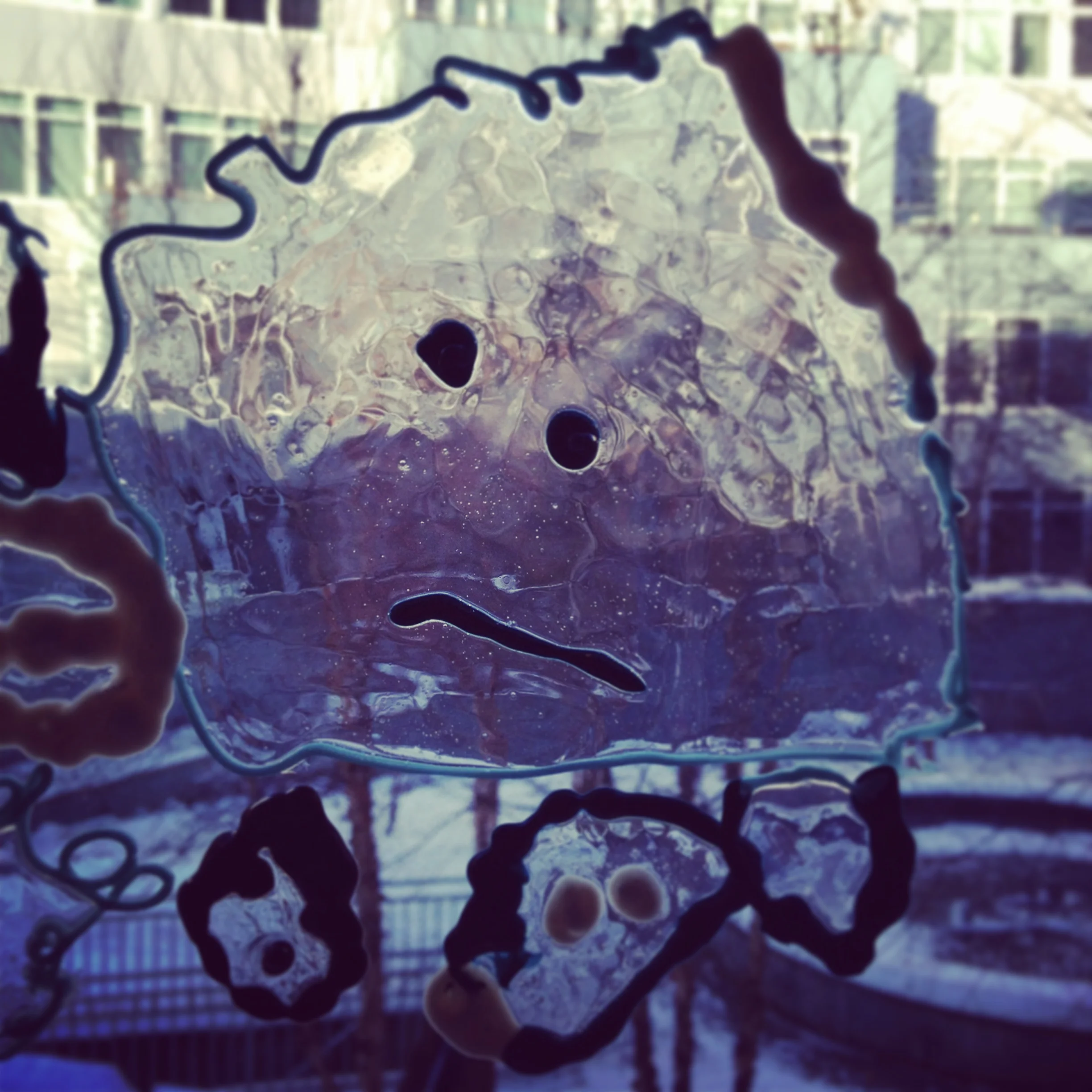 Homemade window clings with my lil girl. These are her original drawings. Faces. Sad, happy and mouthless.