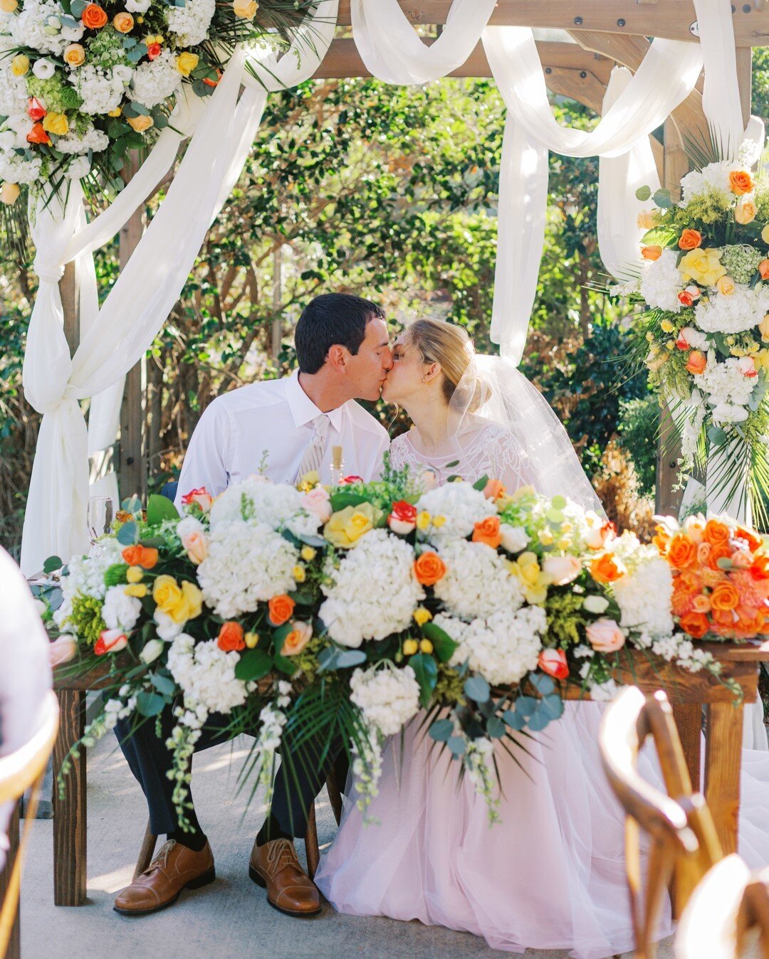 MacKenna + Benjamin. These two were just...JUST...magic. During their ceremony, they both were swaying with each other back and forth, gazing into each other's eyes. I got emotional shooting it! During the reception, the groom's son picked me flowers