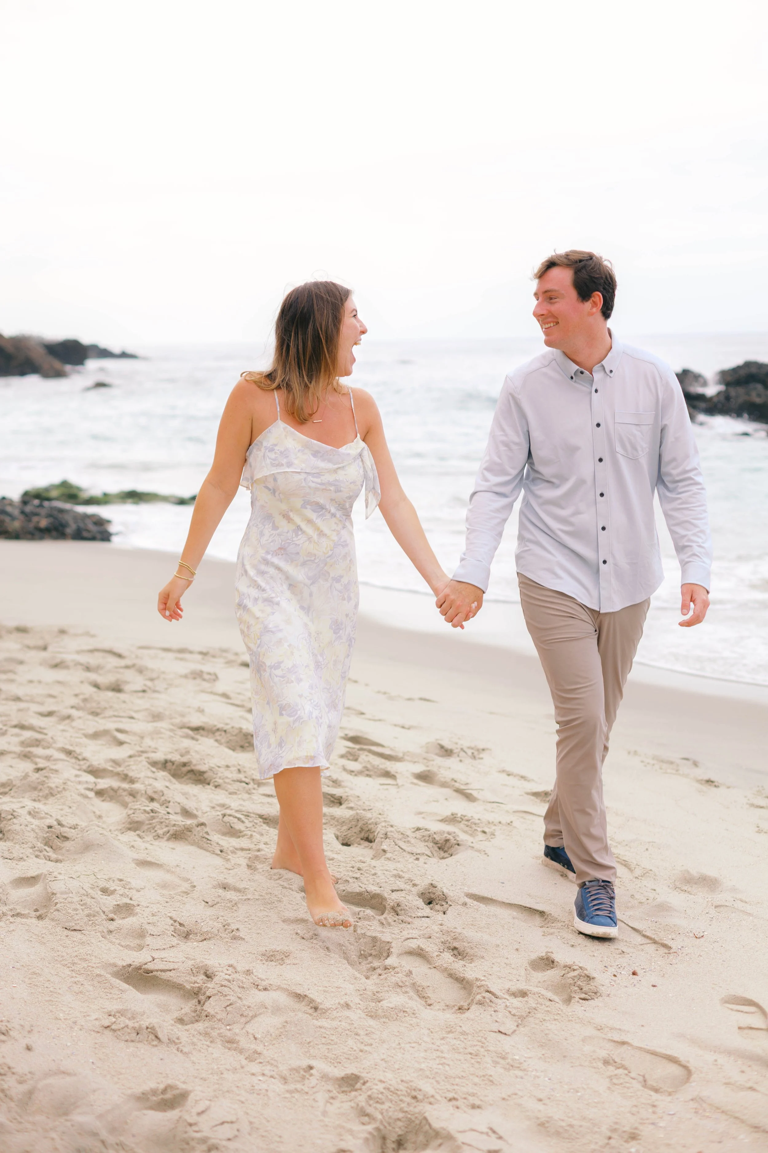 woods-cove-couple-walking-laguna-beach-2.jpg