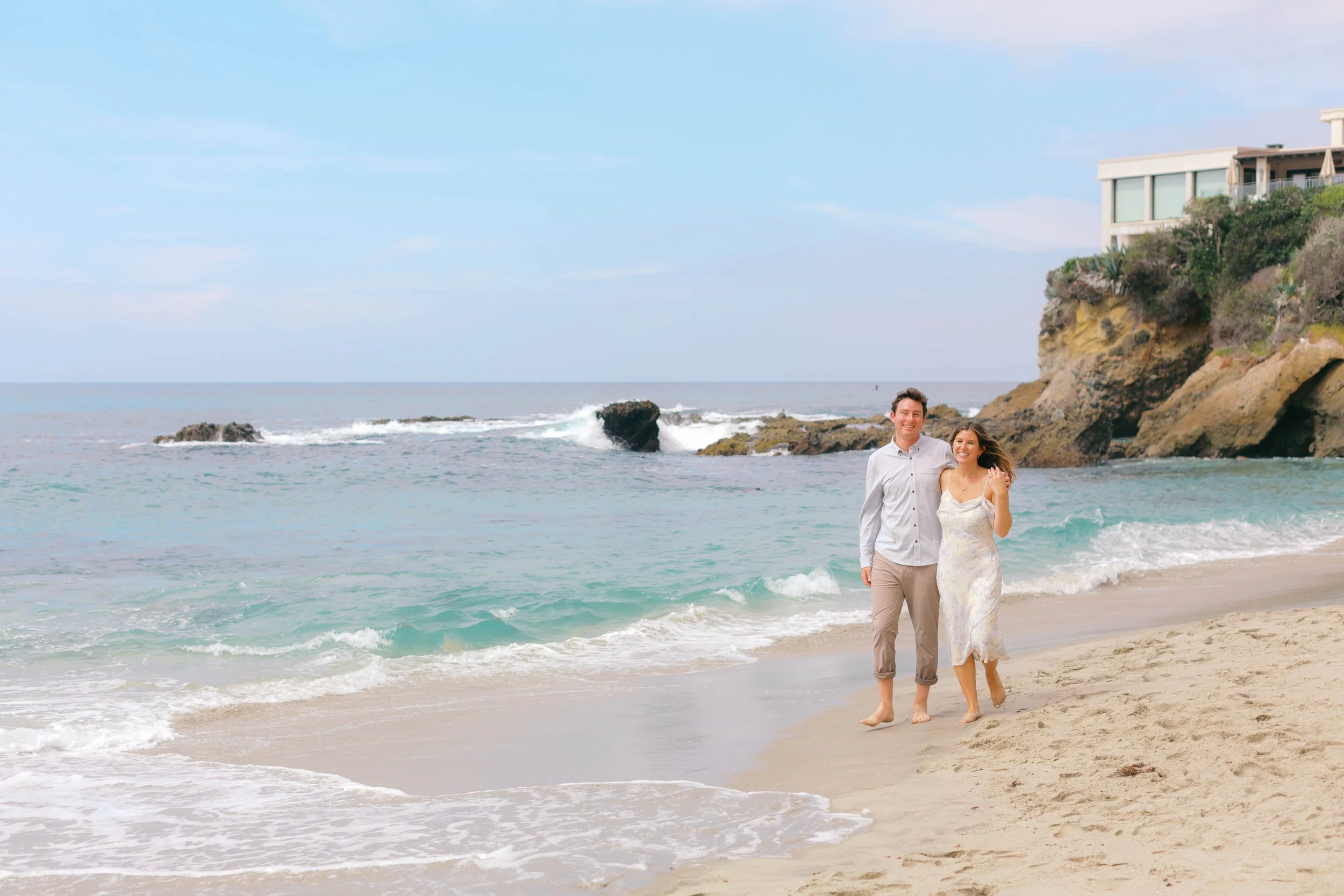 woods-cove-couple-walking-laguna-beach.jpg