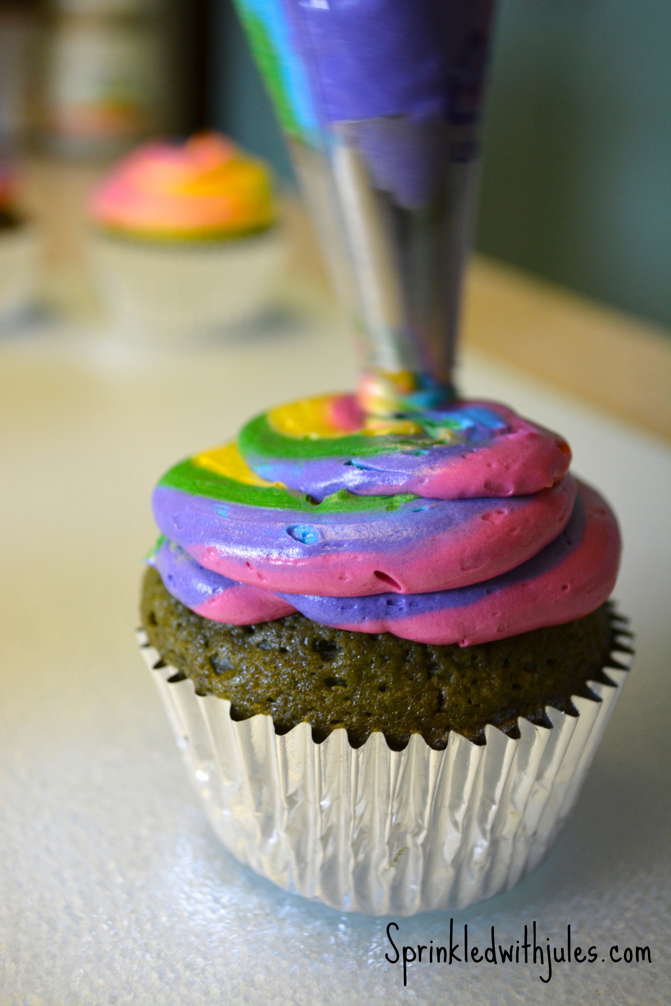  Green Velvet Cupcakes with Rainbow Swirl Frosting 