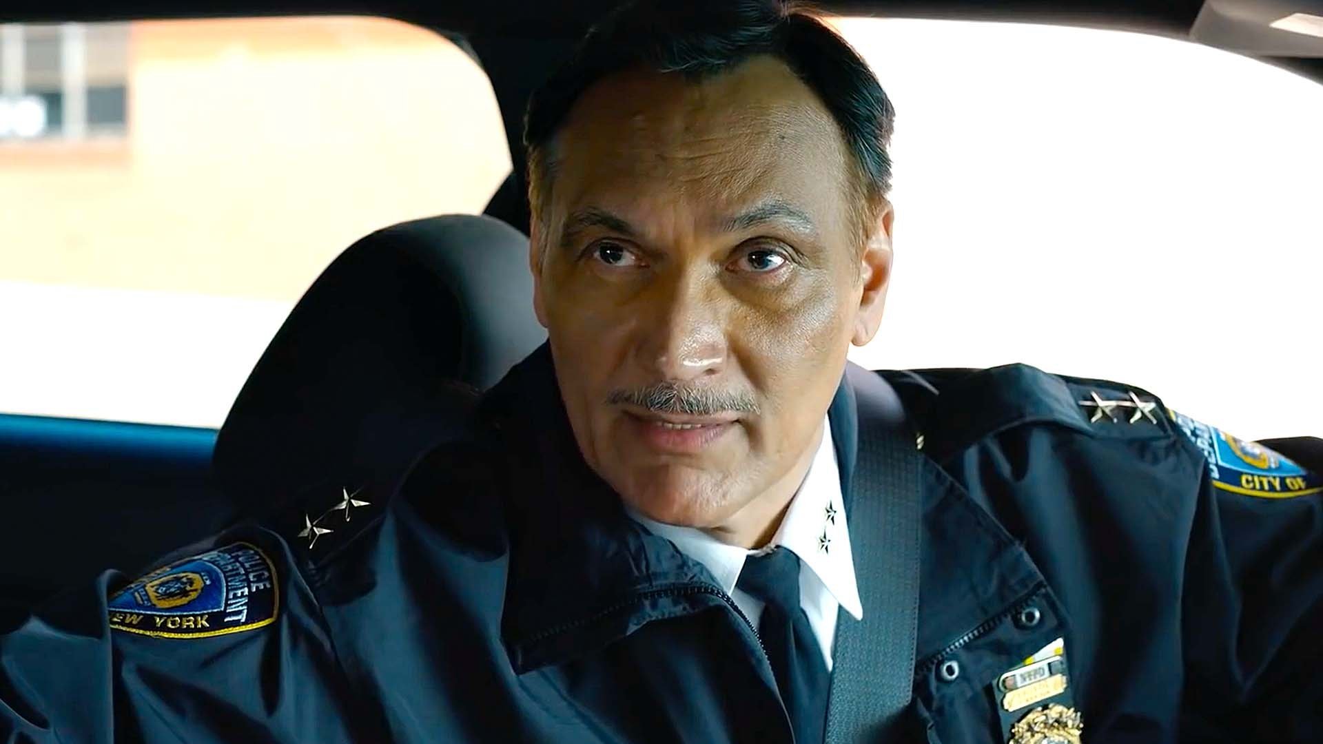 8. Jimmy Smits in cop car.jpeg