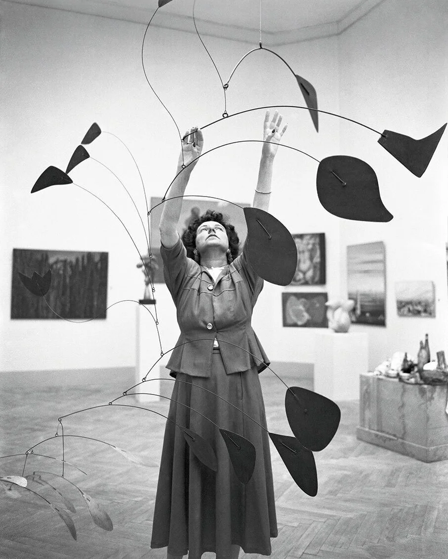 people-peggy-guggenheim-1948-calder-mobile-arc-of-petals.jpg