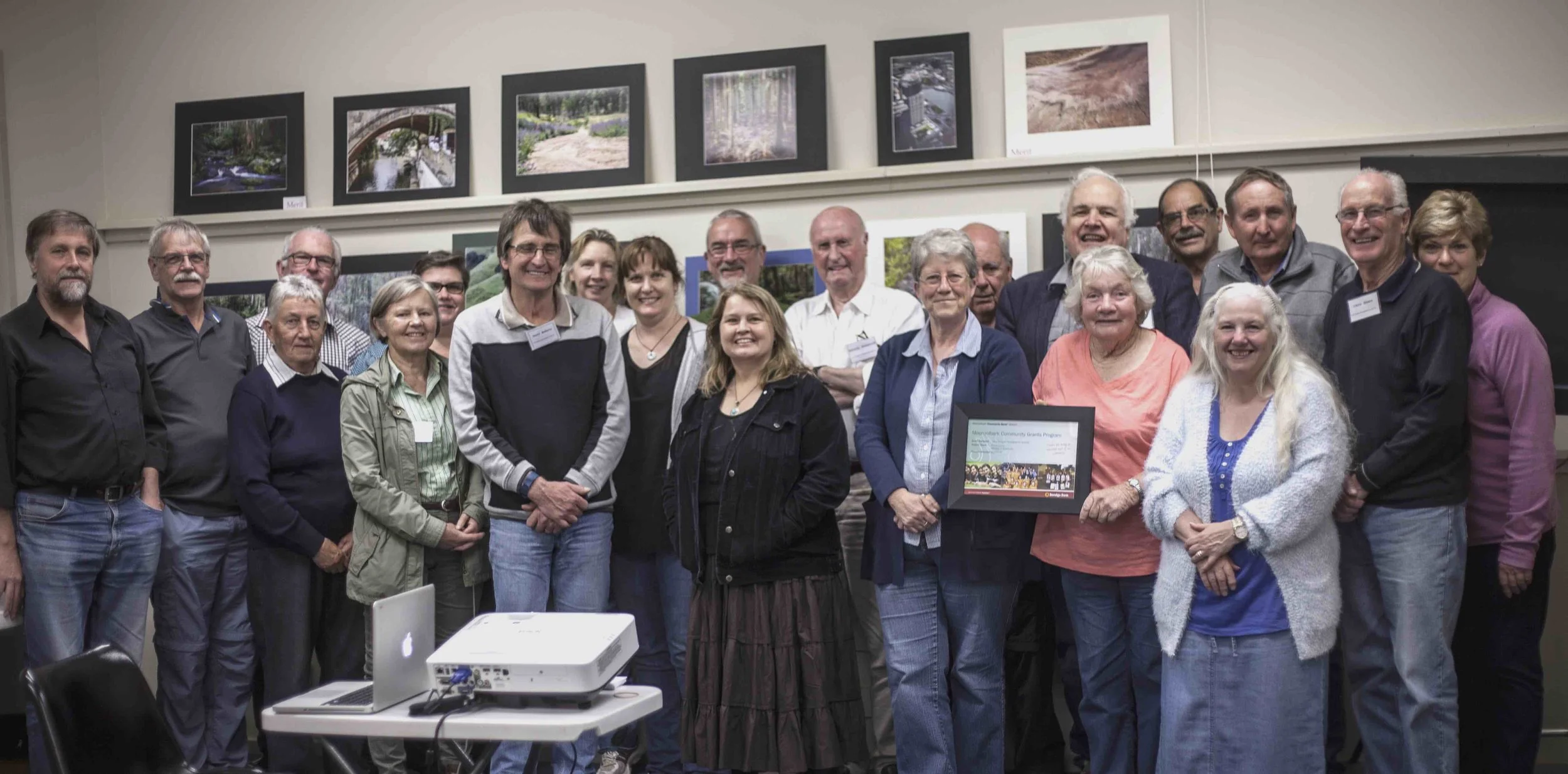 Some of our members proudly displaying our certificate from the Bendigo Bank - Mooroolbark Branch