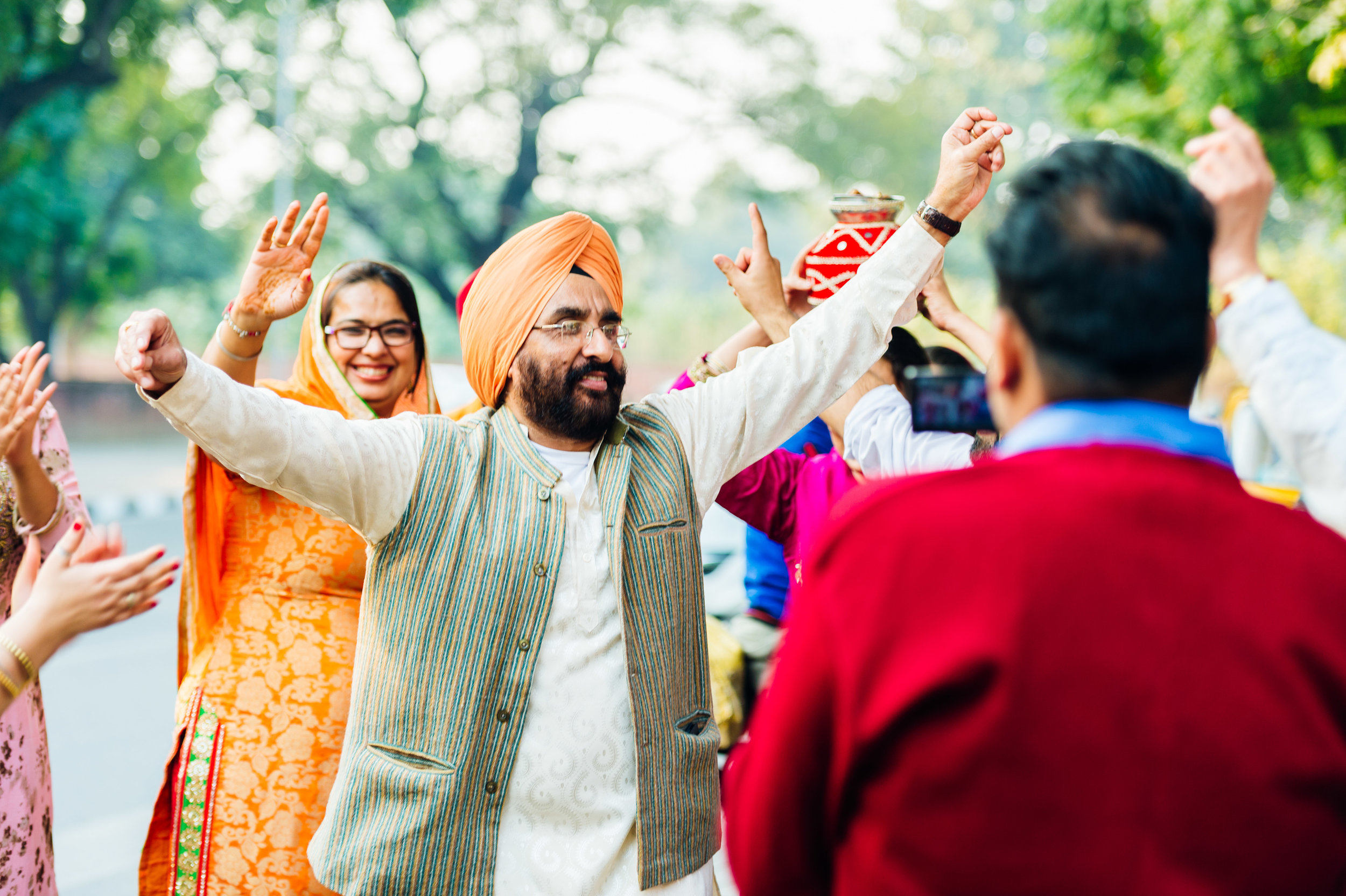  Groom's father happily dancing. 