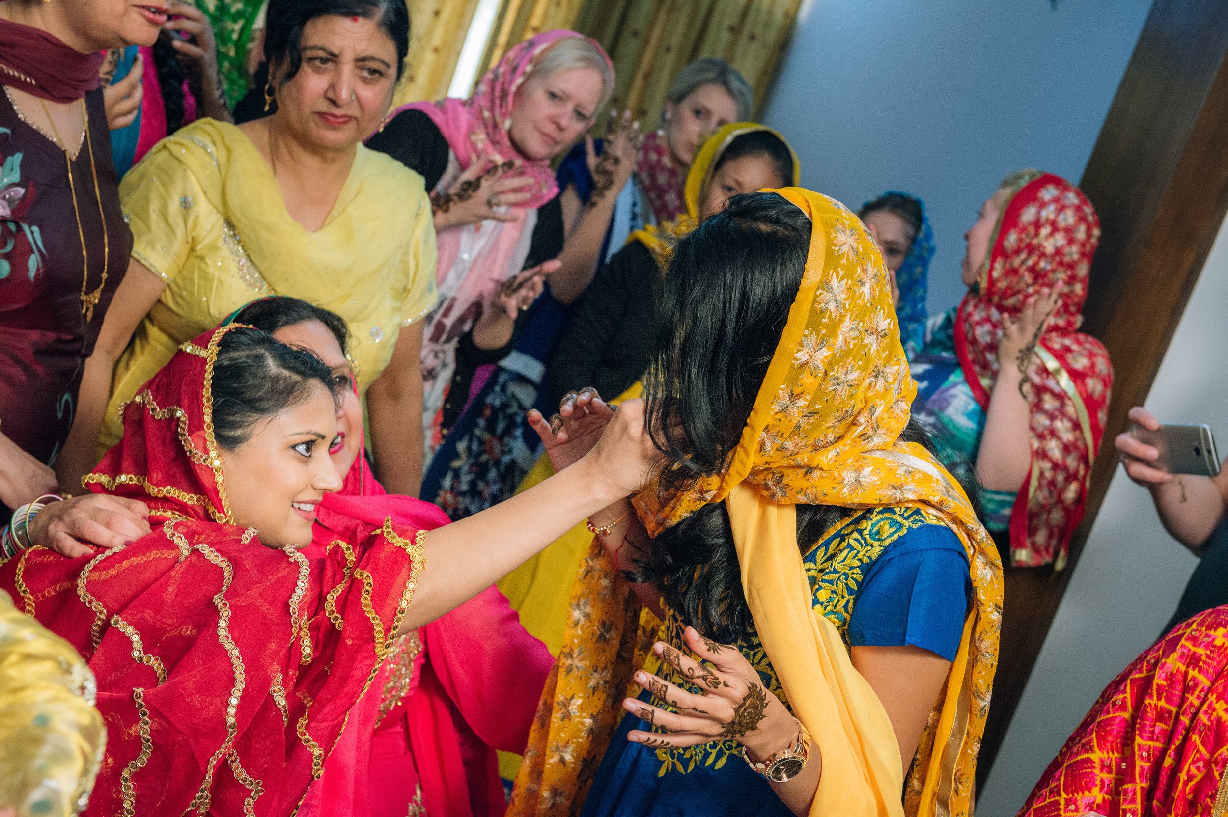  Honestly, I'm not sure what the bride was feeding this dear friend of hers but what I got to know is that the recipient of whatever the bride-to-be is feeding will be the next in line to get married. All the best Shalini!&nbsp; 