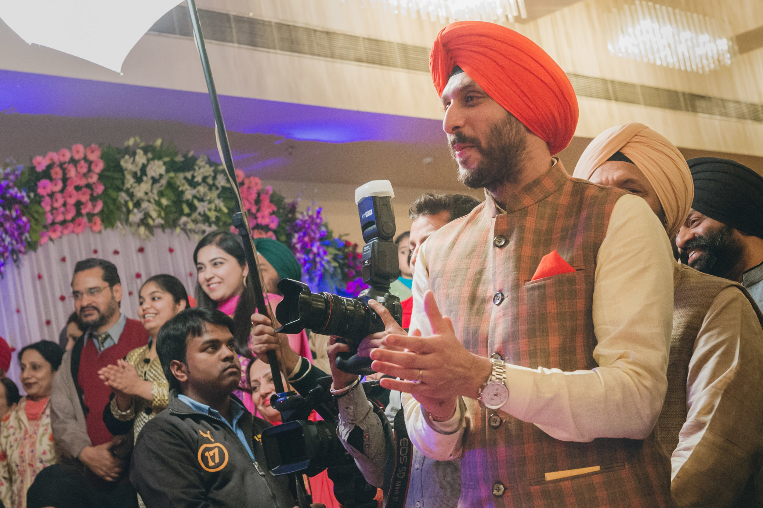  The groom enjoying the special performance put up by his bride. 