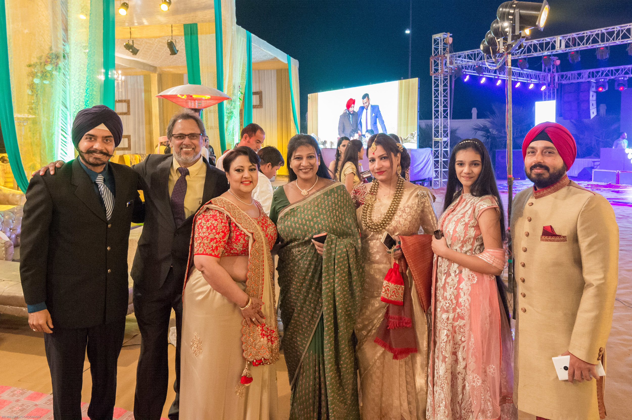  Group picture of the bride's parent's and the guests. 