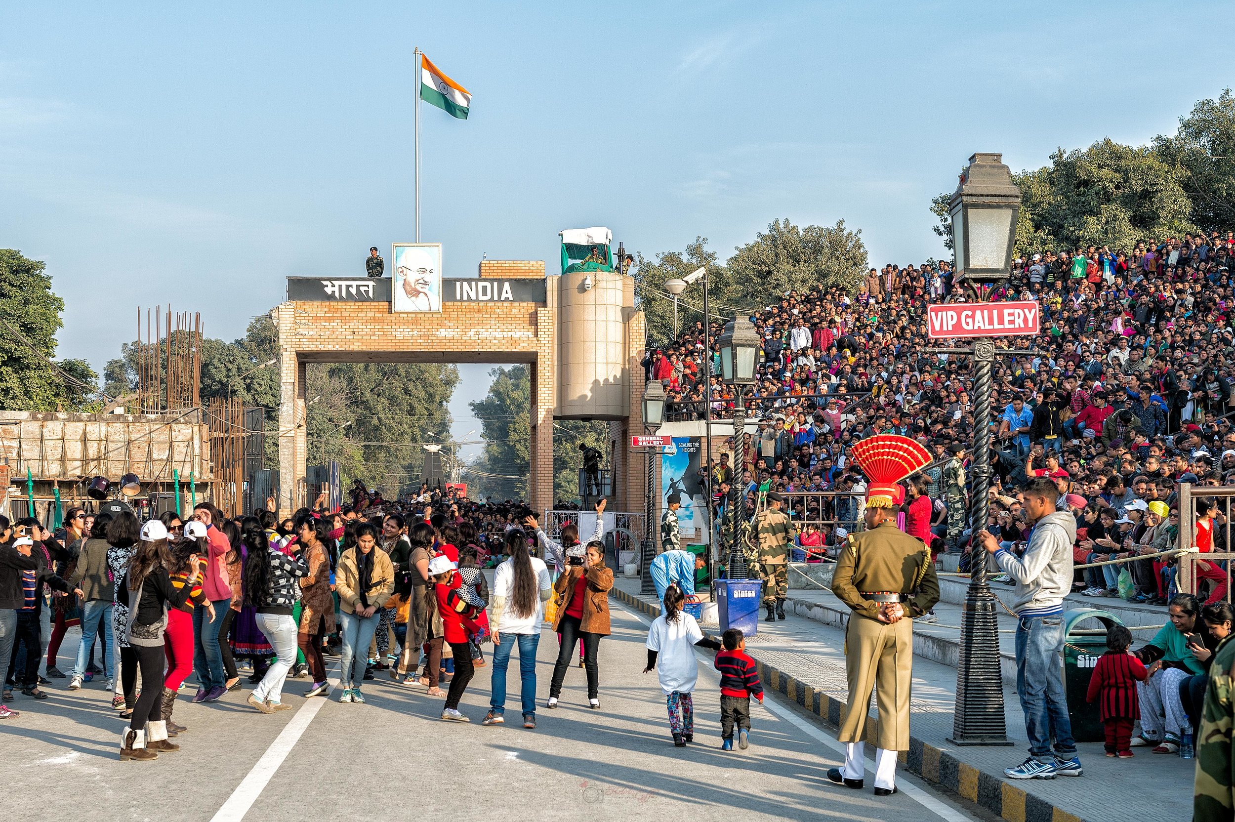  Ladies dancing on the road. Gents aren't allowed to participate.  As foreign visitors, we are lucky that even though the crowd numbers in the thousands, we could still get a seat / space at the VIP gallery. 