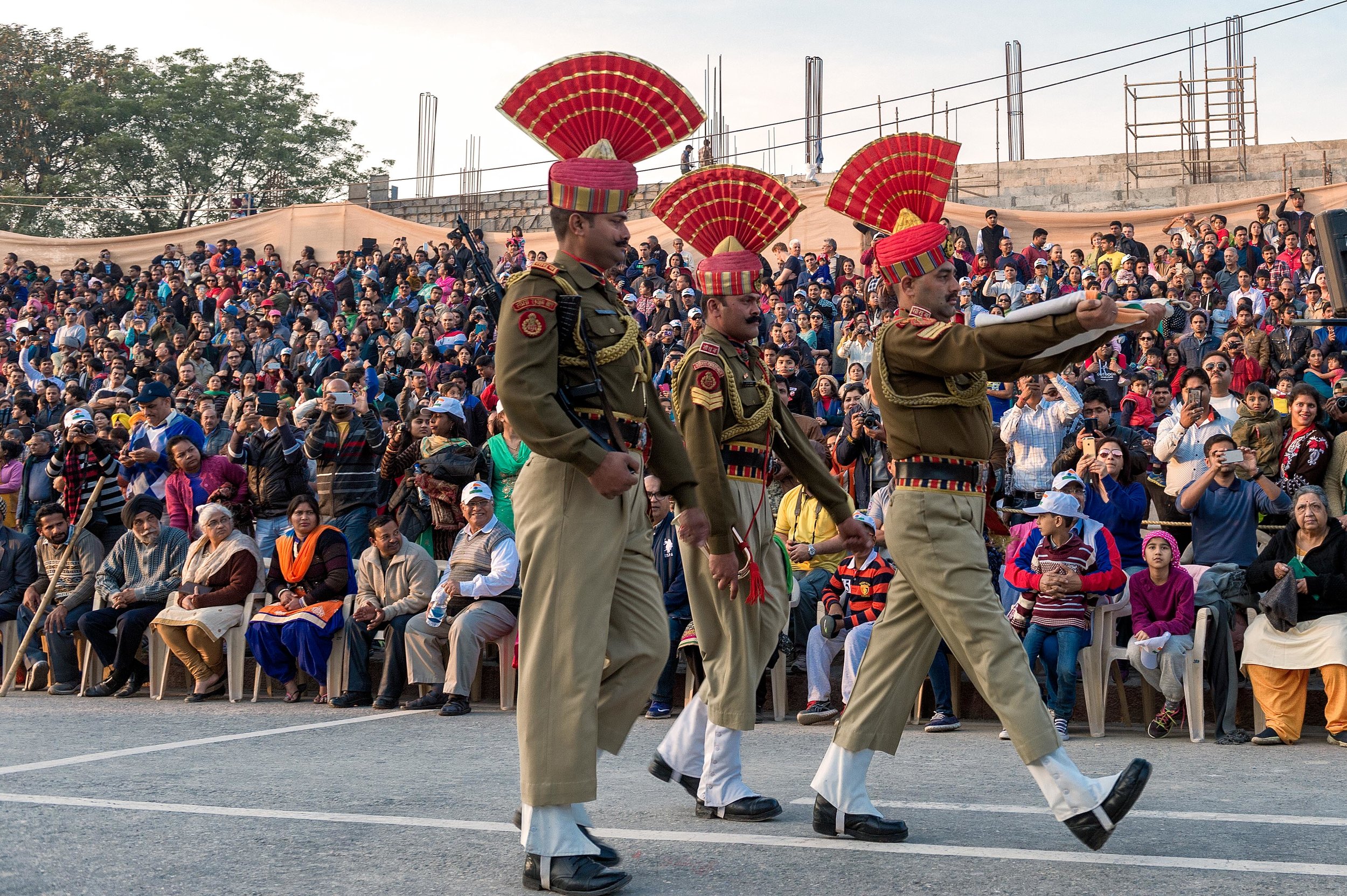  Indian guards marching away with the folded India flag. 