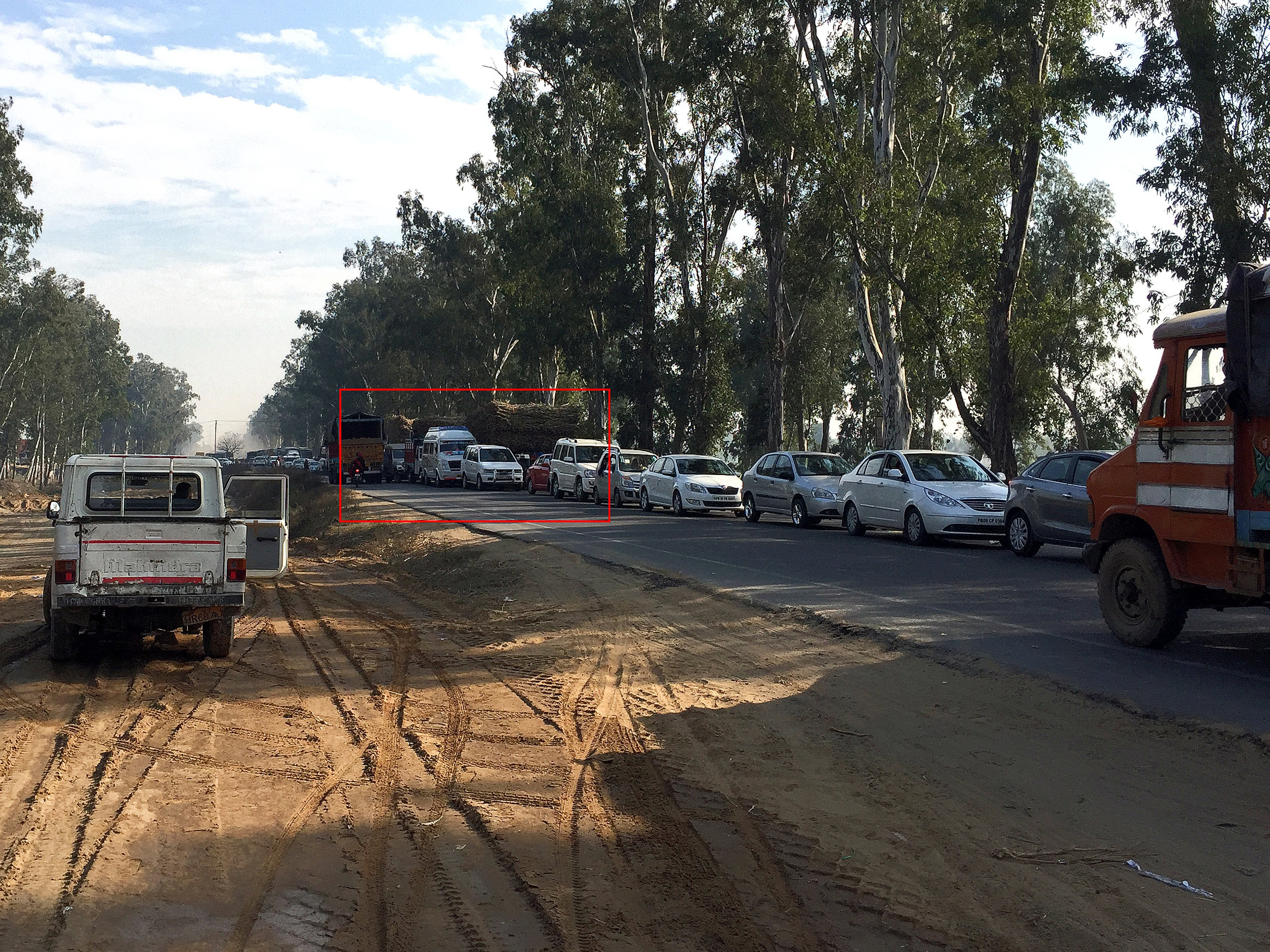  Can you spot our Traveller pulling up alongside the sugarcane transporter?&nbsp; (Image taken with iPhone 6+)  