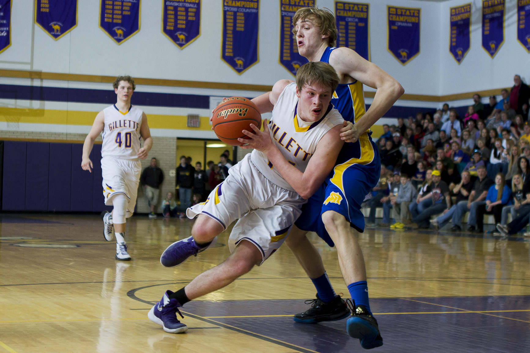 Gillette senior Dalton Holst drives to the basket Friday night during the final regular season game against Sheridan at CCHS North Campus. Holst lead the team with 17 points, helping the Camels beat the Broncs 72-66 in overtime to finish the season 8-2, second in the East.