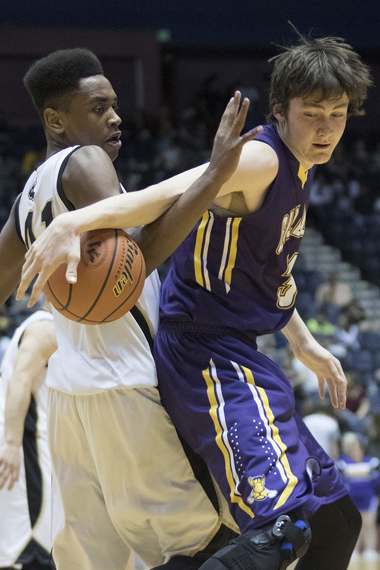 Gillette senior Kain Morehead fights to keep control of the ball during the semifinal match-up against Cheyenne South Friday night at the Casper Event Center. Gillette lost 66-60 and will play Kelly Walsh for the third place spot, while Cheyenne South will play Cheyenne Central for the state title Saturday.