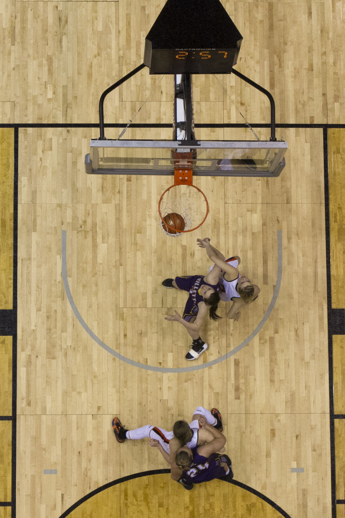 Gillette's Abby Moerkerke boxes out a Natrona player as the Camels score during the championship game against Natrona County Saturday afternoon at the Casper Events Center in Casper. Gillette beat Natrona 84-62 to win the 4A state title for the second year in a row.
