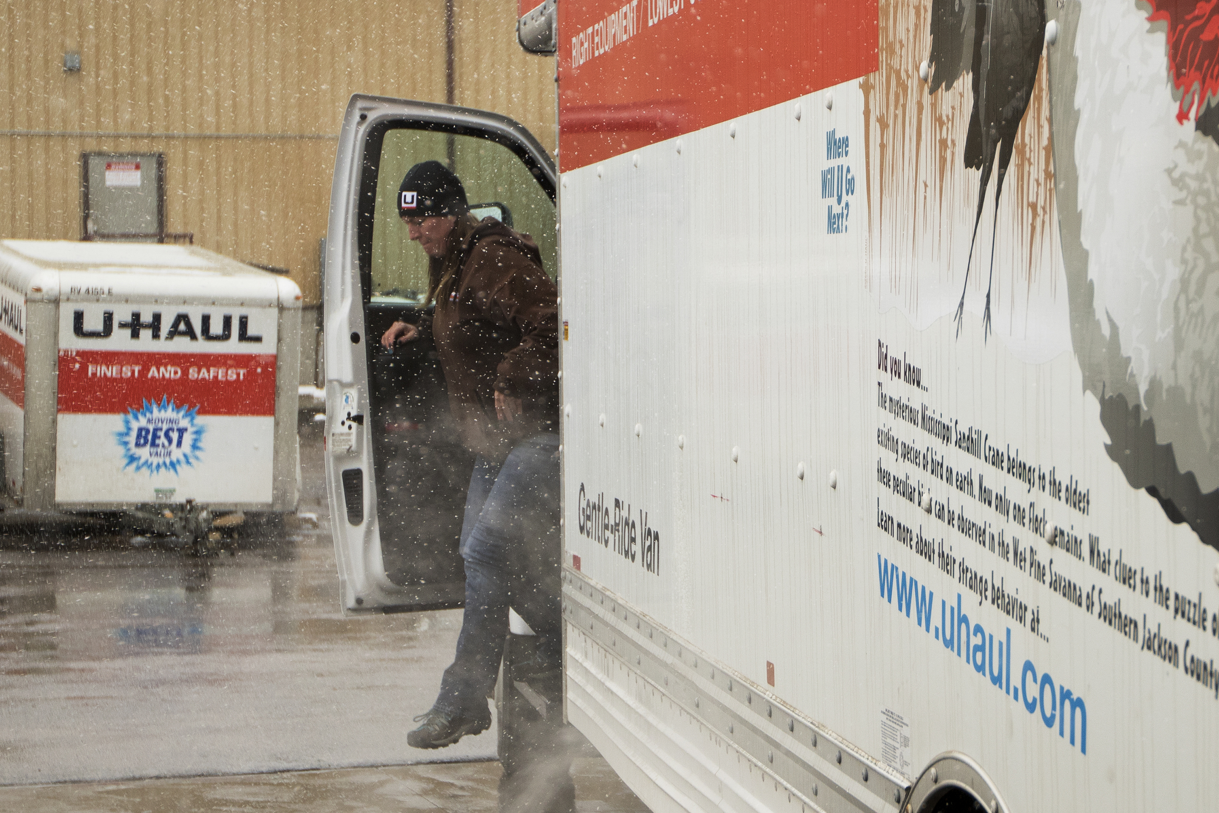Heidi Buen gets out of a U-Haul truck after getting it ready for a customer Friday afternoon on the lot at KP Management where she works. The lost is mostly empty these days as the trucks are hard to come by everywhere from Billings to Rapid City. "The whole region is wiped out," said KP Management owner Kristene Partlow, "There's way more demand than supply."