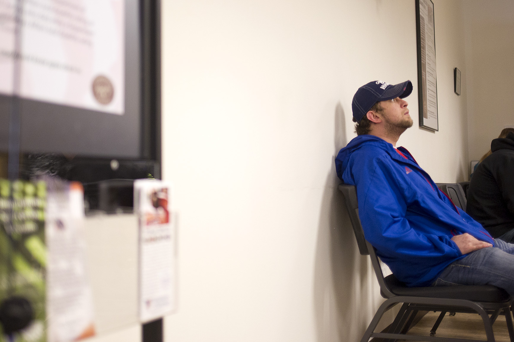 Matt Johnson waits at the Wyoming Department of Workforce Services offices in Gillette on Thursday March 31, 2016. Johnson was working for Big Horn Tire servicing the vehicles at Black Thunder Mine when he went into surgery to have a brain tumor removed. He expected to return to work within about two weeks when he got the call telling him he had been laid off. "They let me go and I just got done with a brain surgery, so..." he said, "I'm kinda without a paddle."