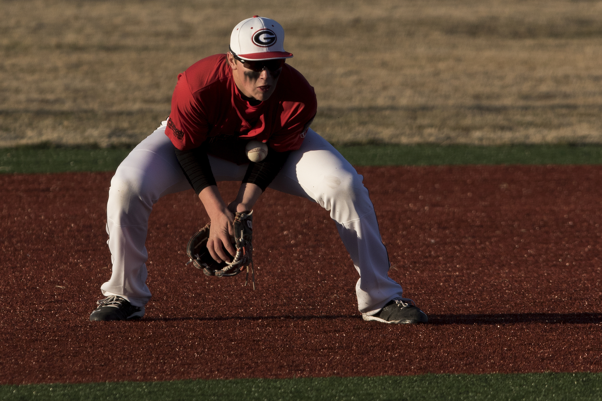 Gillette Roughrider Josh Hughes stops the ball during the Riders season opening 7-0 win over the Sturgis Scoopers Thursday evening at Hladky Memorial Stadium.