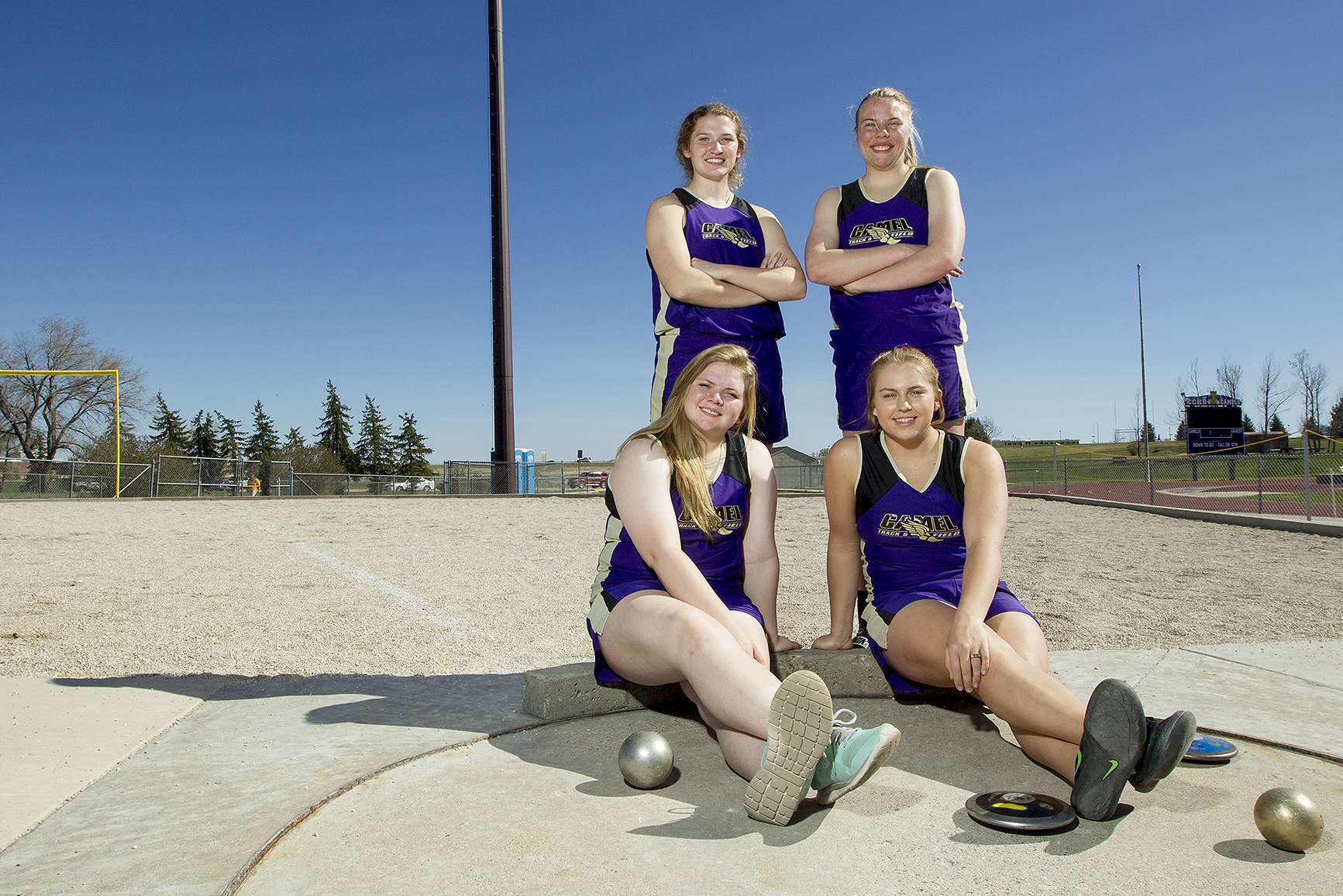 Gillette throwers Makayla Tucker, clockwise from back left, Jordan Fink, Taylor Smith and Shantell Gladson, photographed Thursday at the CCHS shot put pit, have all qualified for the state track meet in either the shot put or discuss, less than halfway through the season. Gladson won the indoor shot put title with a throw of 35 feet and 10.5 inches.