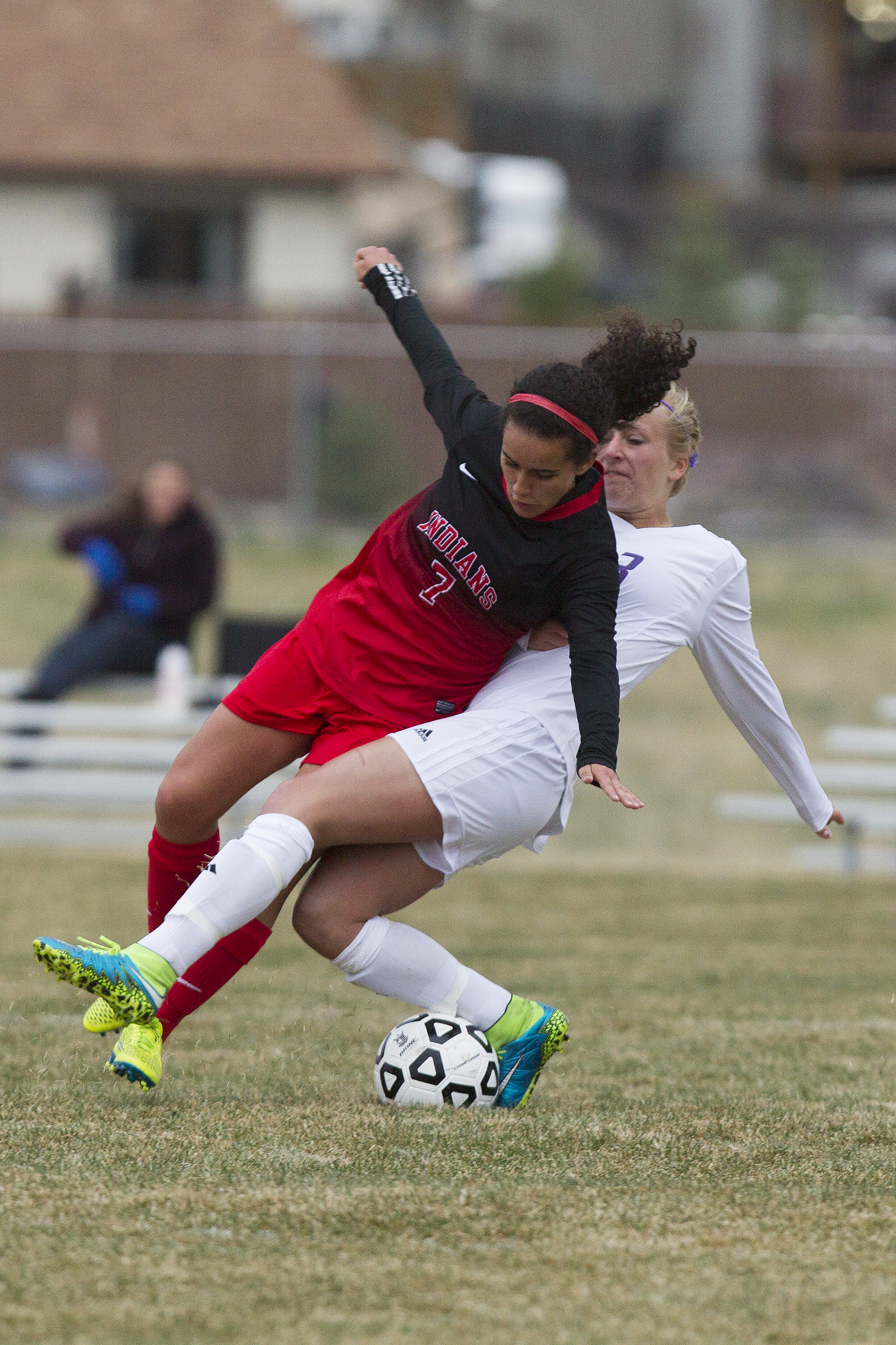 Gillette's Emma Jurewicz collides with Cheyenne Central's Alexa Becerra during the teams' 1-1 draw Friday night at CCHS South Campus. Jurewicz was shown two yellow cards during the game and was ejected during extra time.