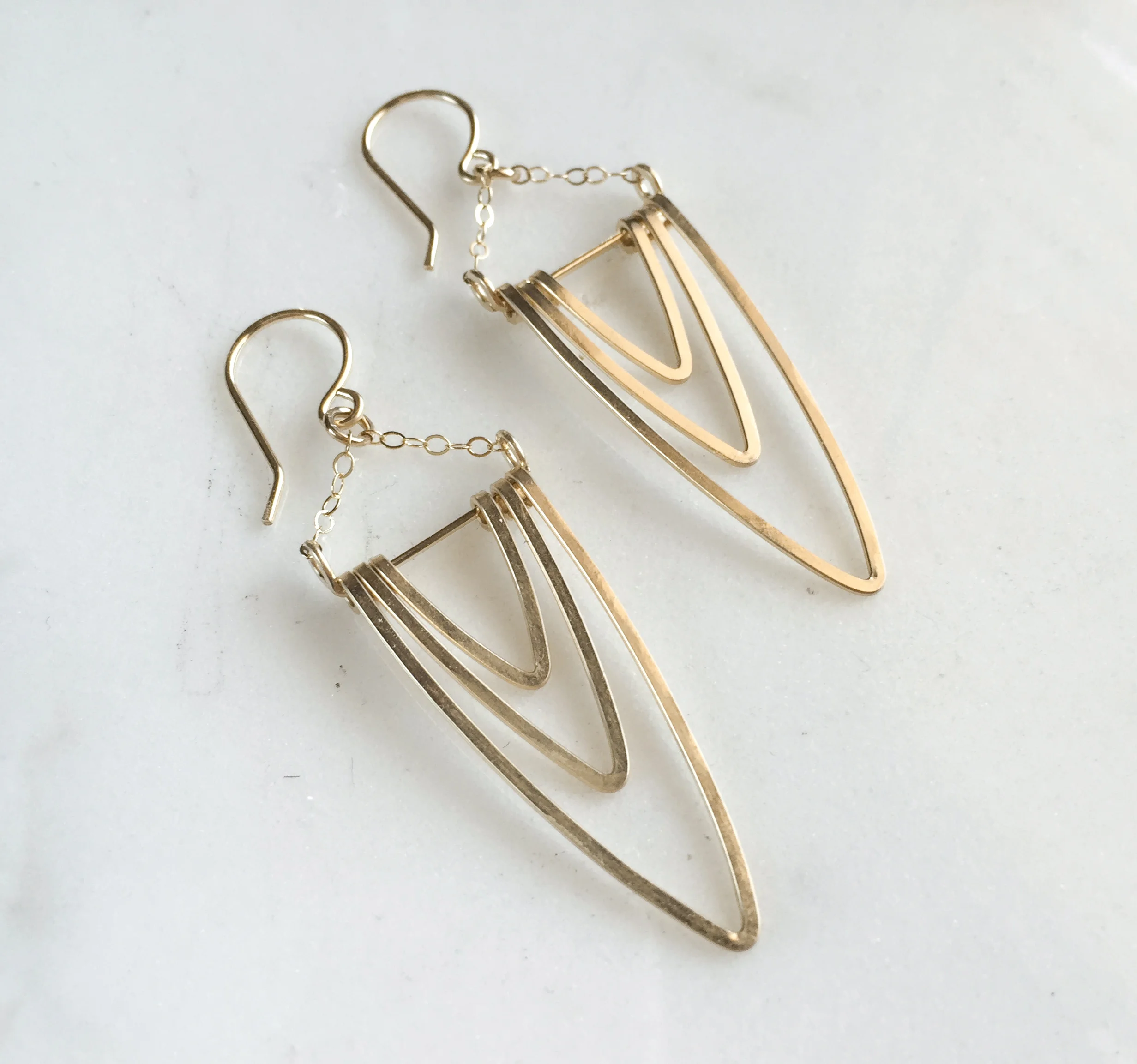 gold arch hoop earrings