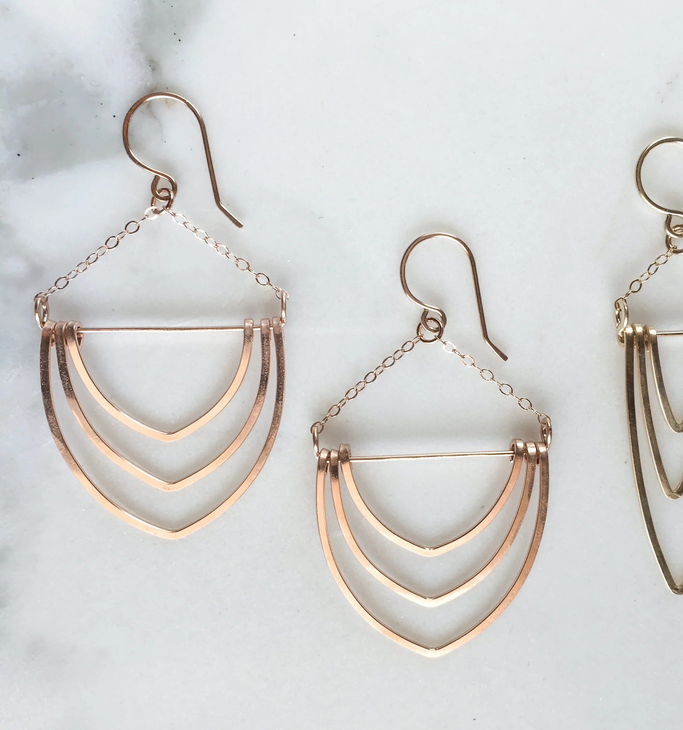 pink gold arch earrings