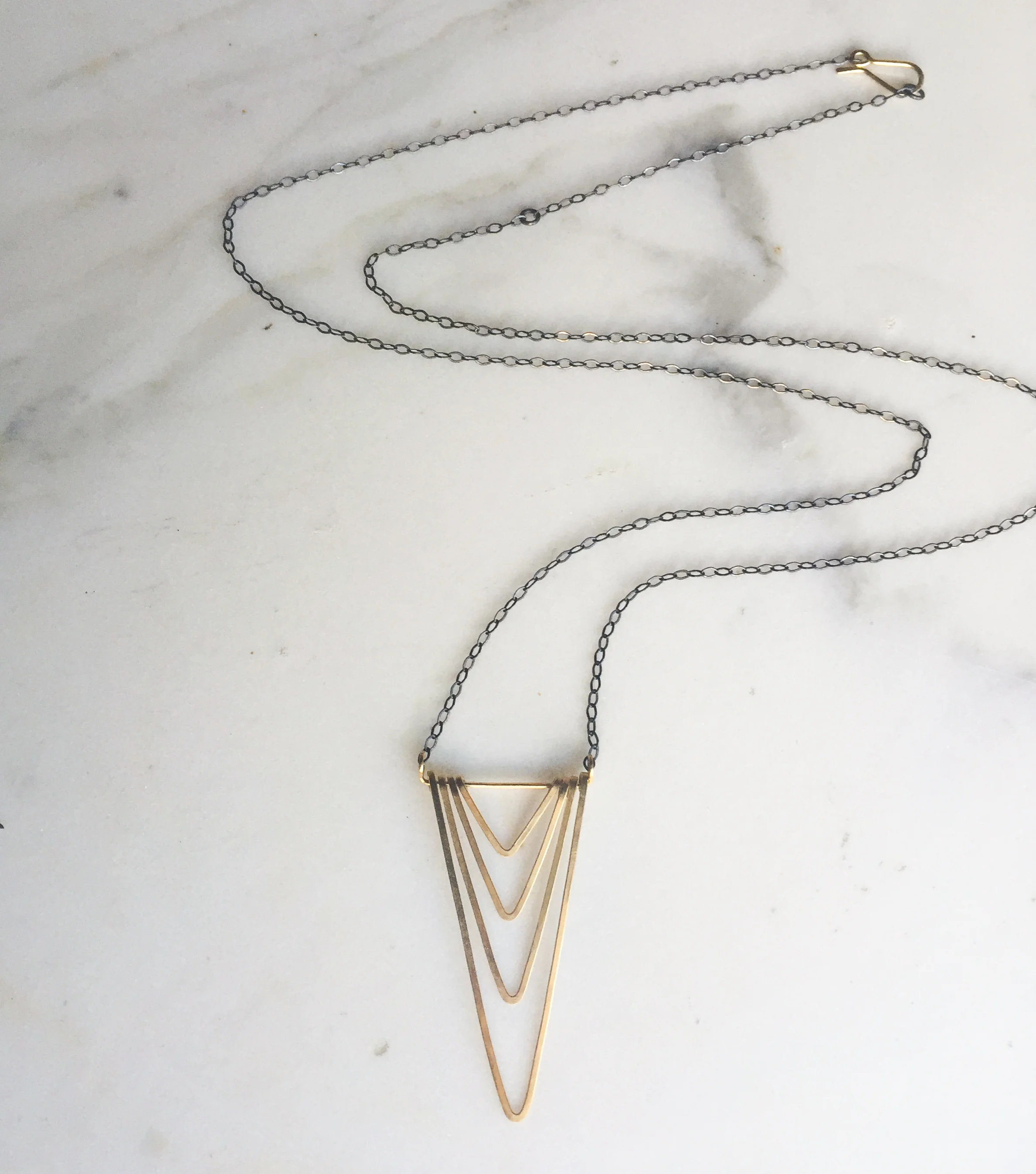 long gold triangle necklace