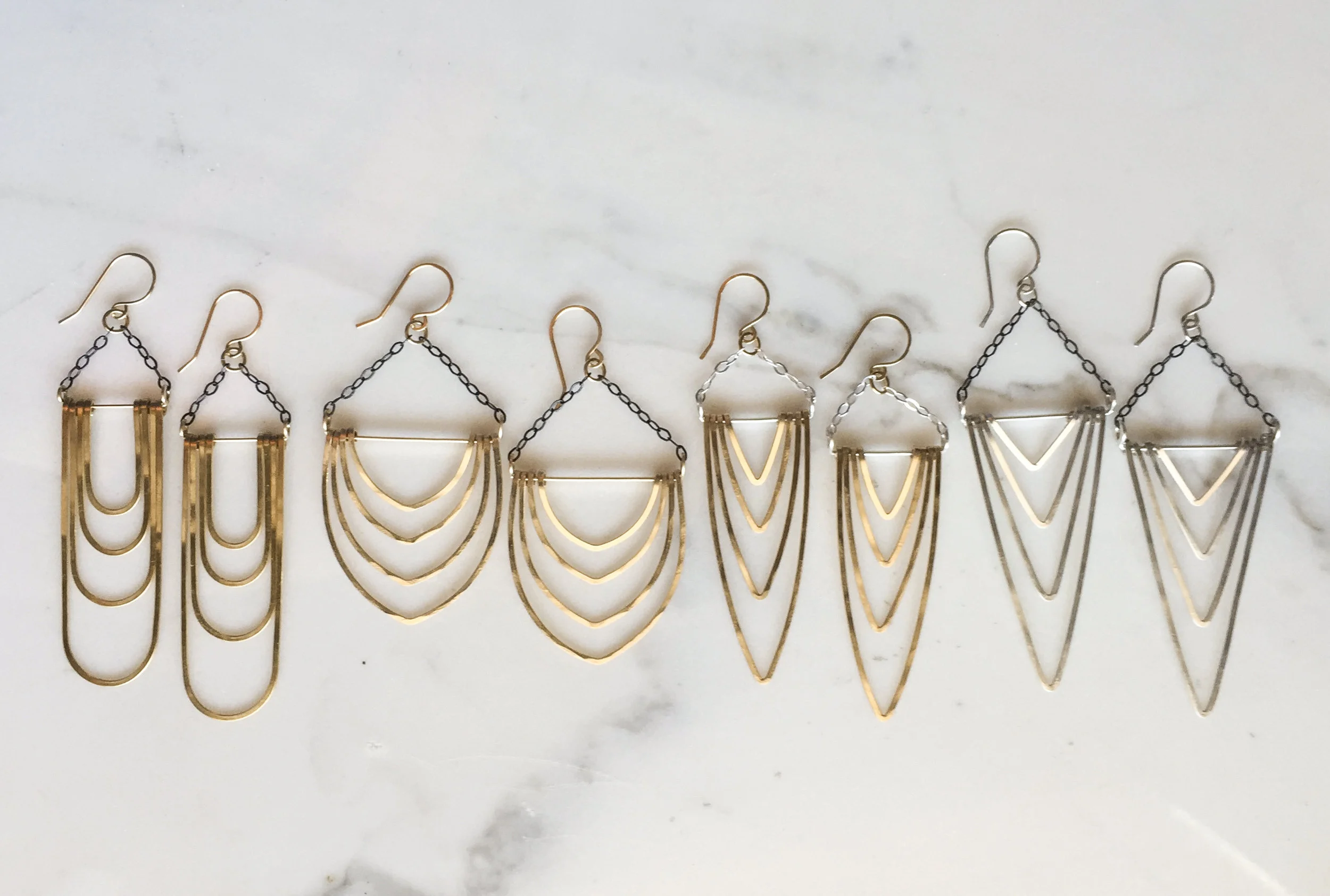 layered gold arch earrings