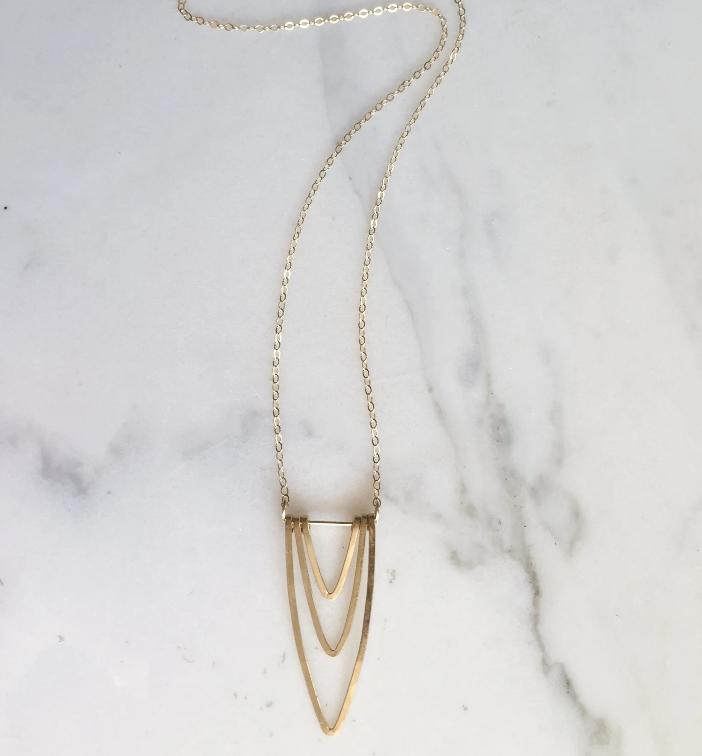 layered gold arch necklace