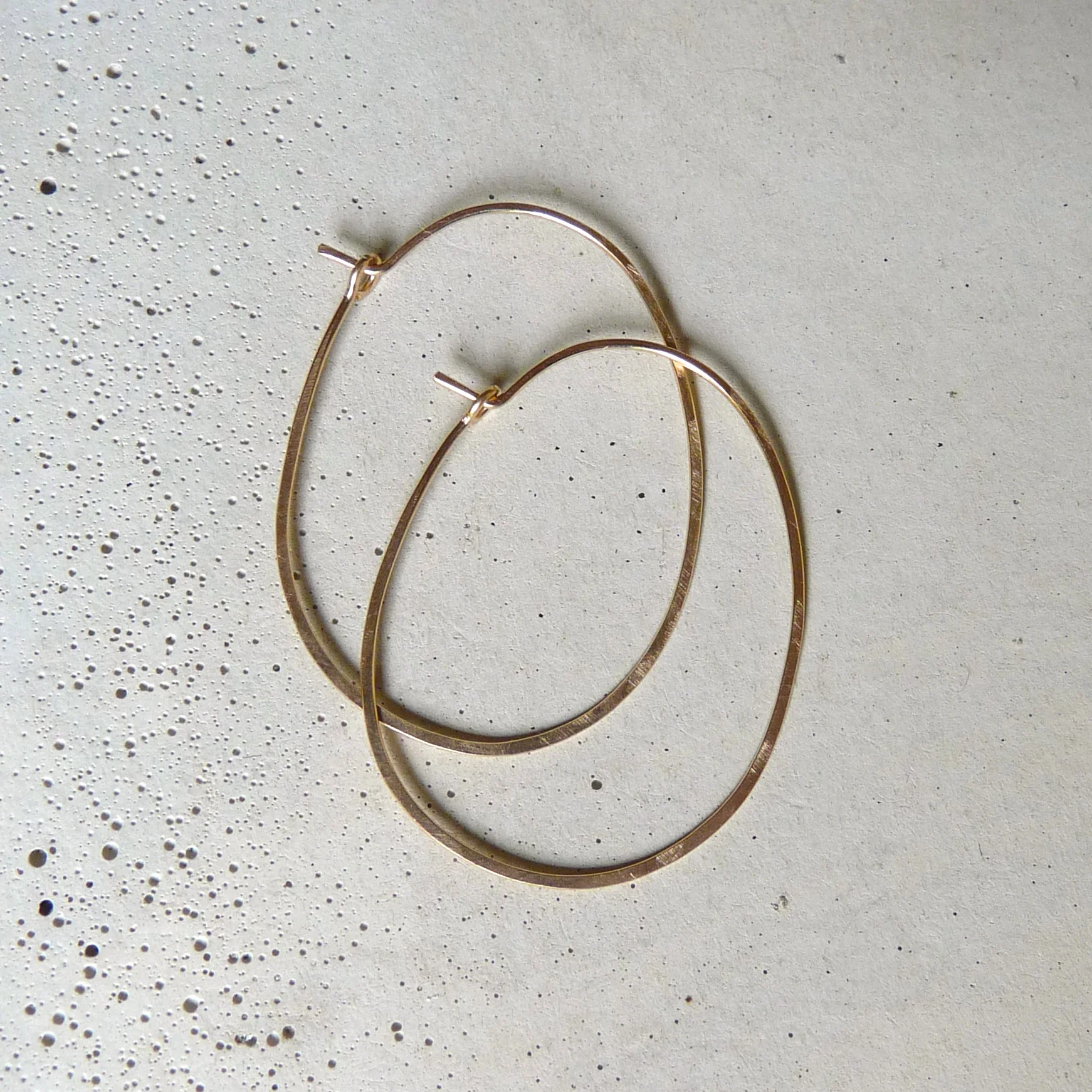hammered gold oval hoops