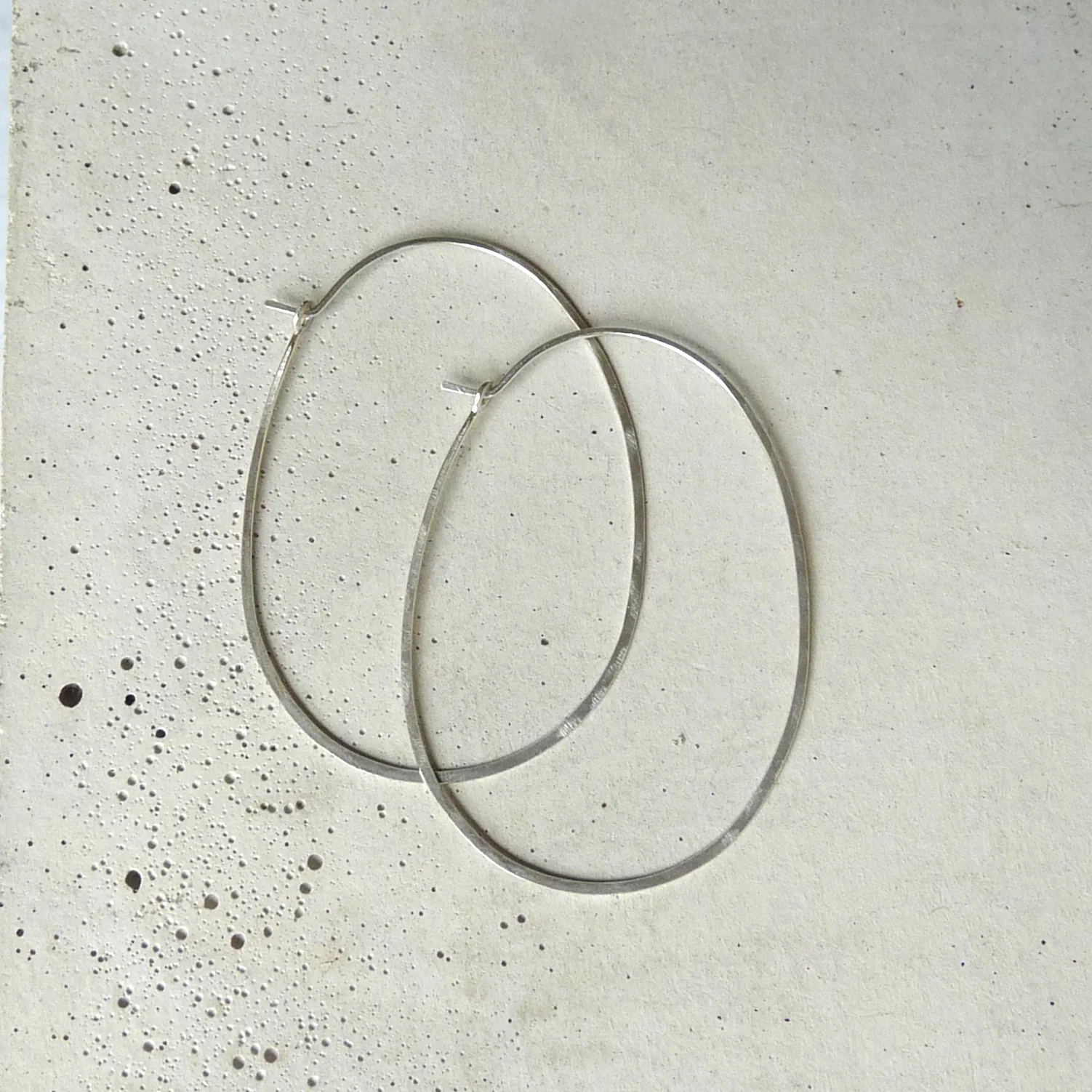 hammered sterling silver oval hoops