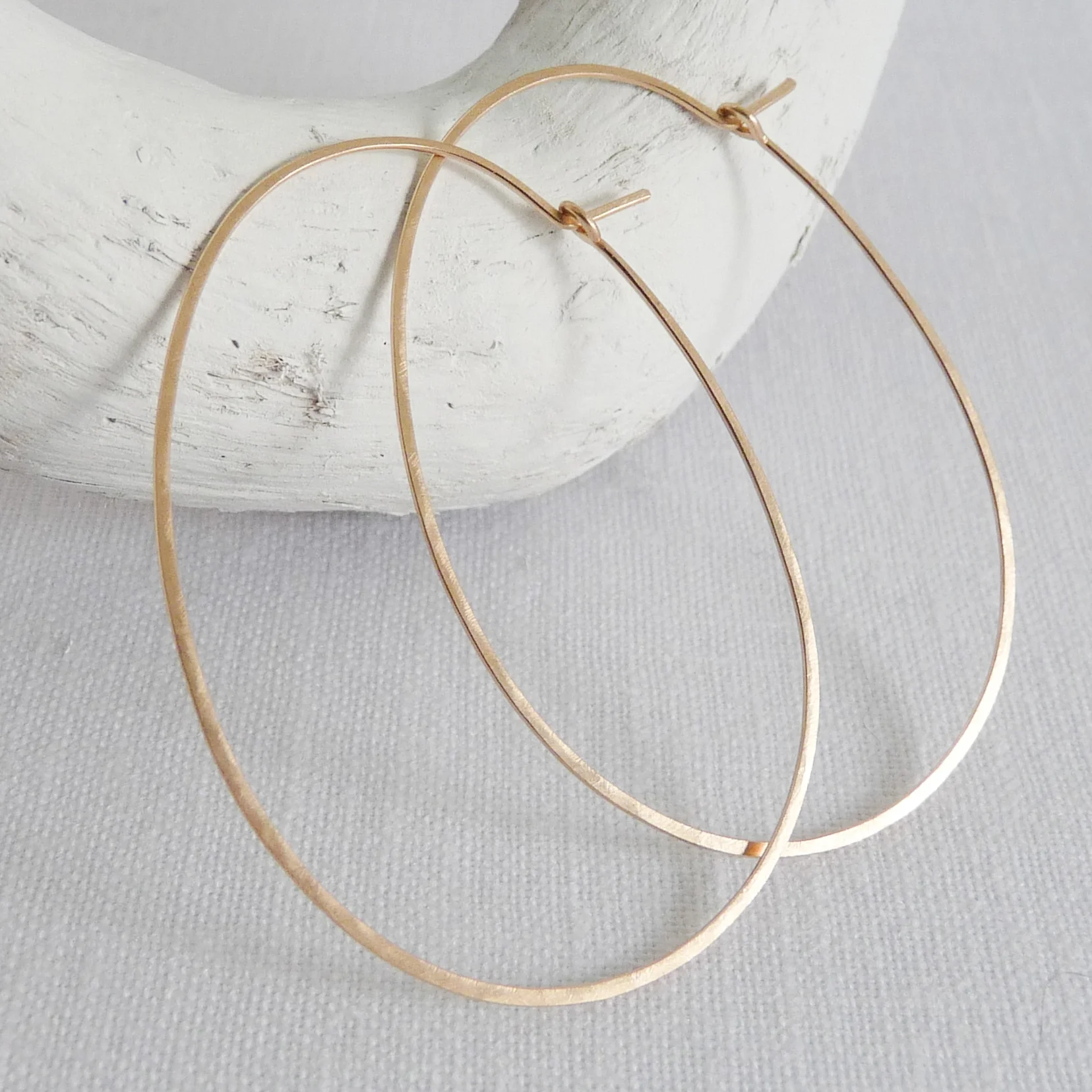 large gold oval hoops
