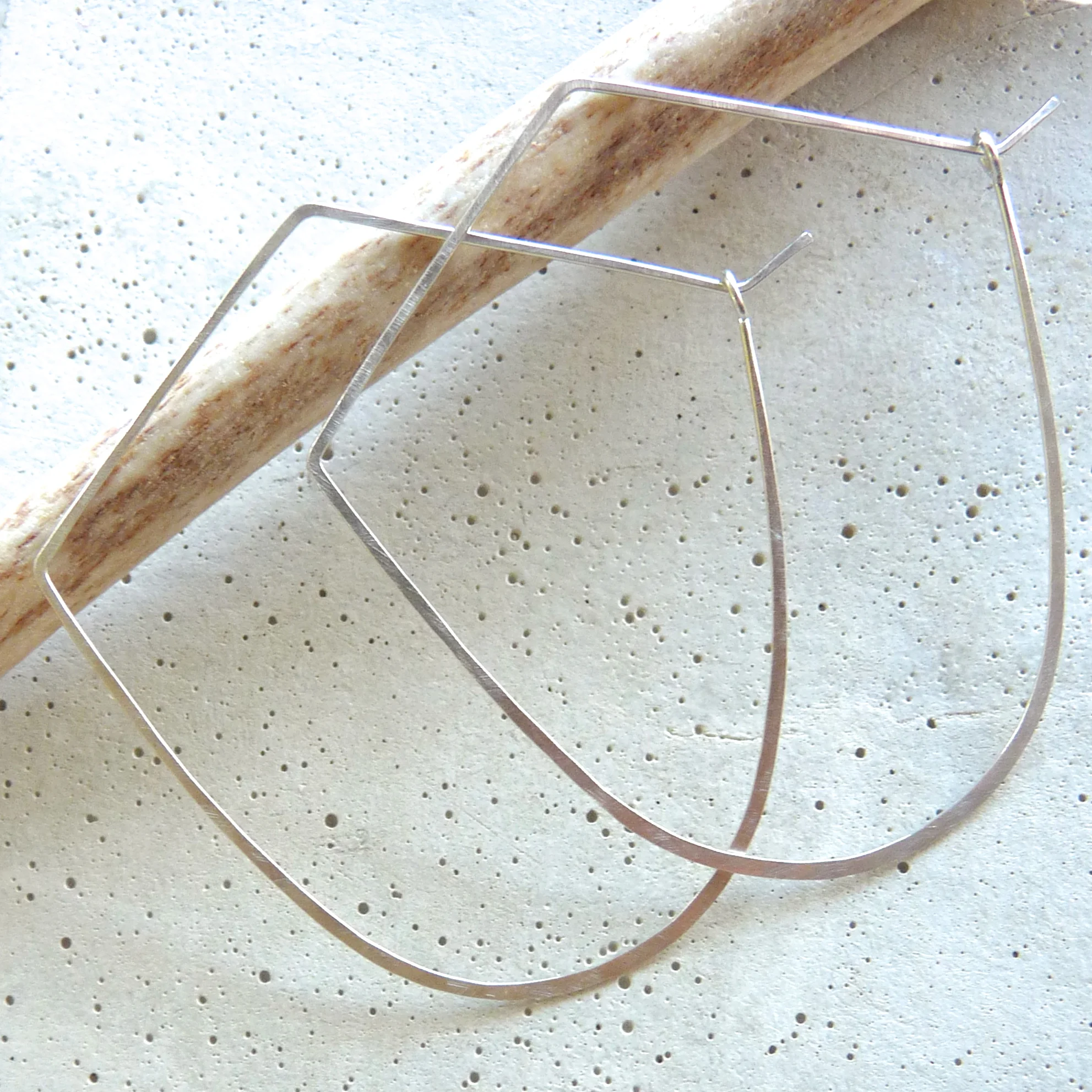 big silver hoop earrings