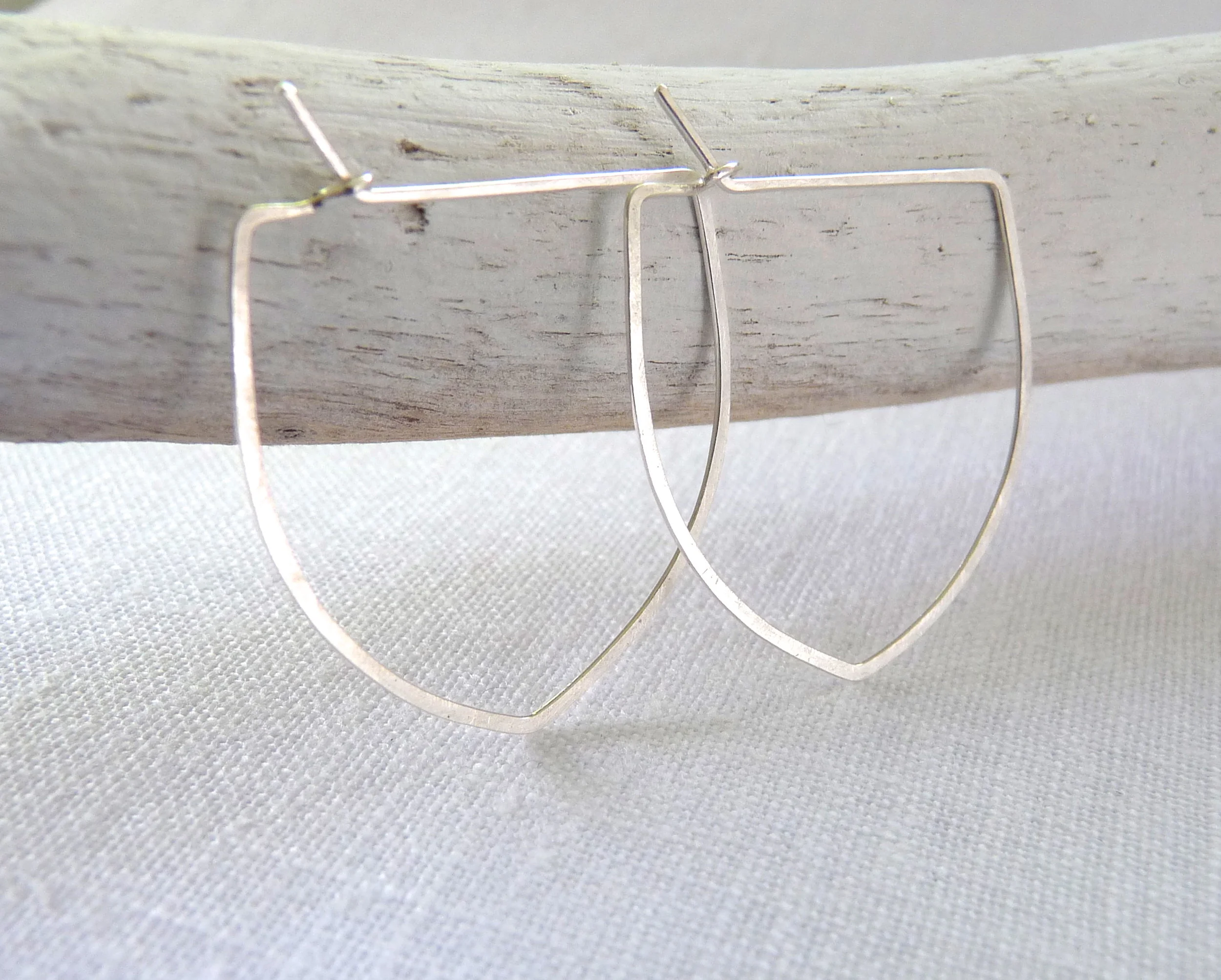 silver arch hoop earrings