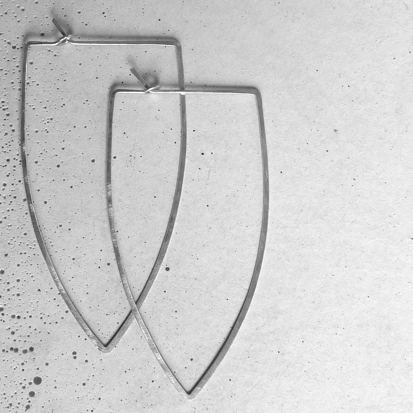 silver tusk hoop earrings