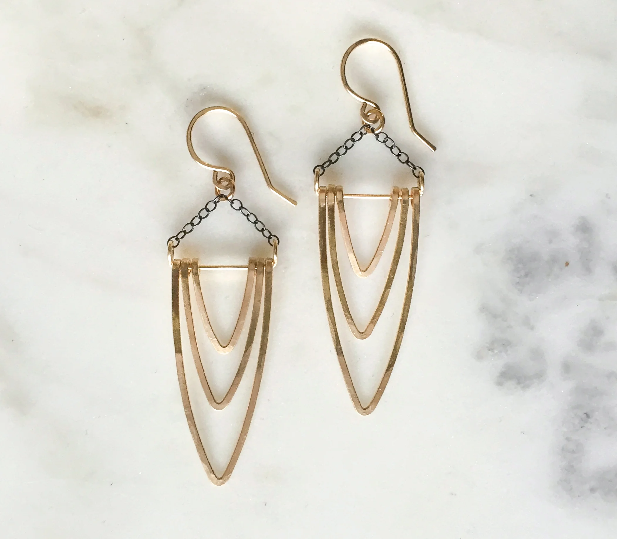pointed gold layered arch earrings