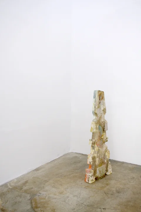 Amy Brener, Bit , 2012, 15 x 38 x 2.5 in, Resin, gypsum, pigment, fresnel lens, found objects 