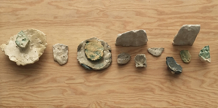 tactile fragments , fired and glazed clay on wood pedestal, 24 x 48 in, 2015