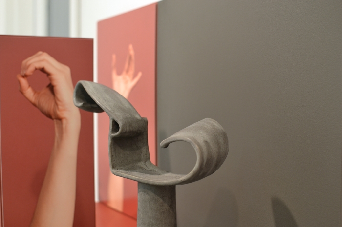 Ellie Krakow "Arm Armature #2" (detail), 2016 Glazed ceramic, photographs on aluminum, and wood